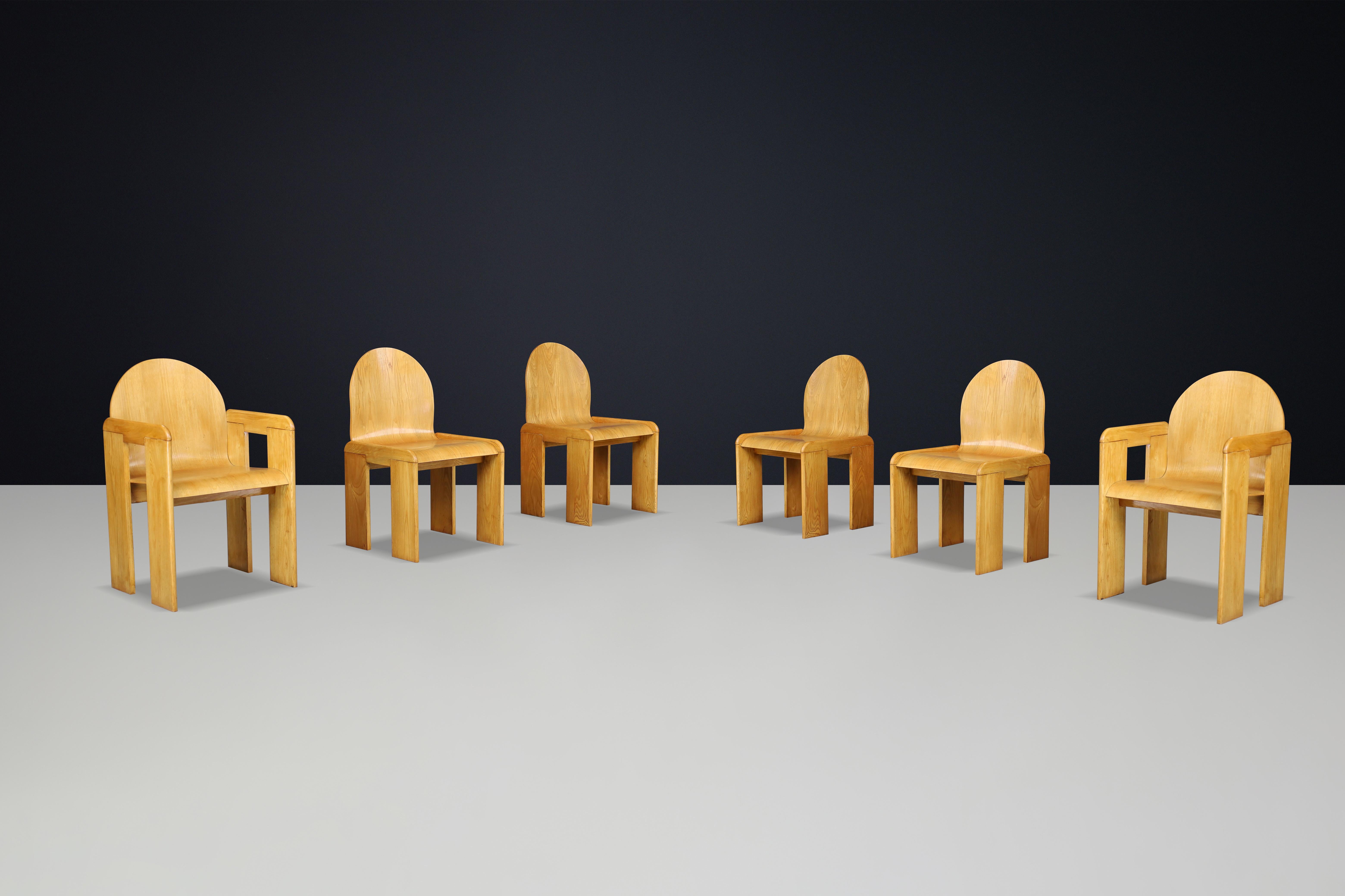 Afra & Tobia Scarpa (attributed) Dining Room Chairs in Ash and Plywood, Italy, 1970s

This exquisite set of six dining chairs, attributed to the renowned design duo Afra & Tobia Scarpa, showcases a harmonious blend of solid ash and elegantly crafted