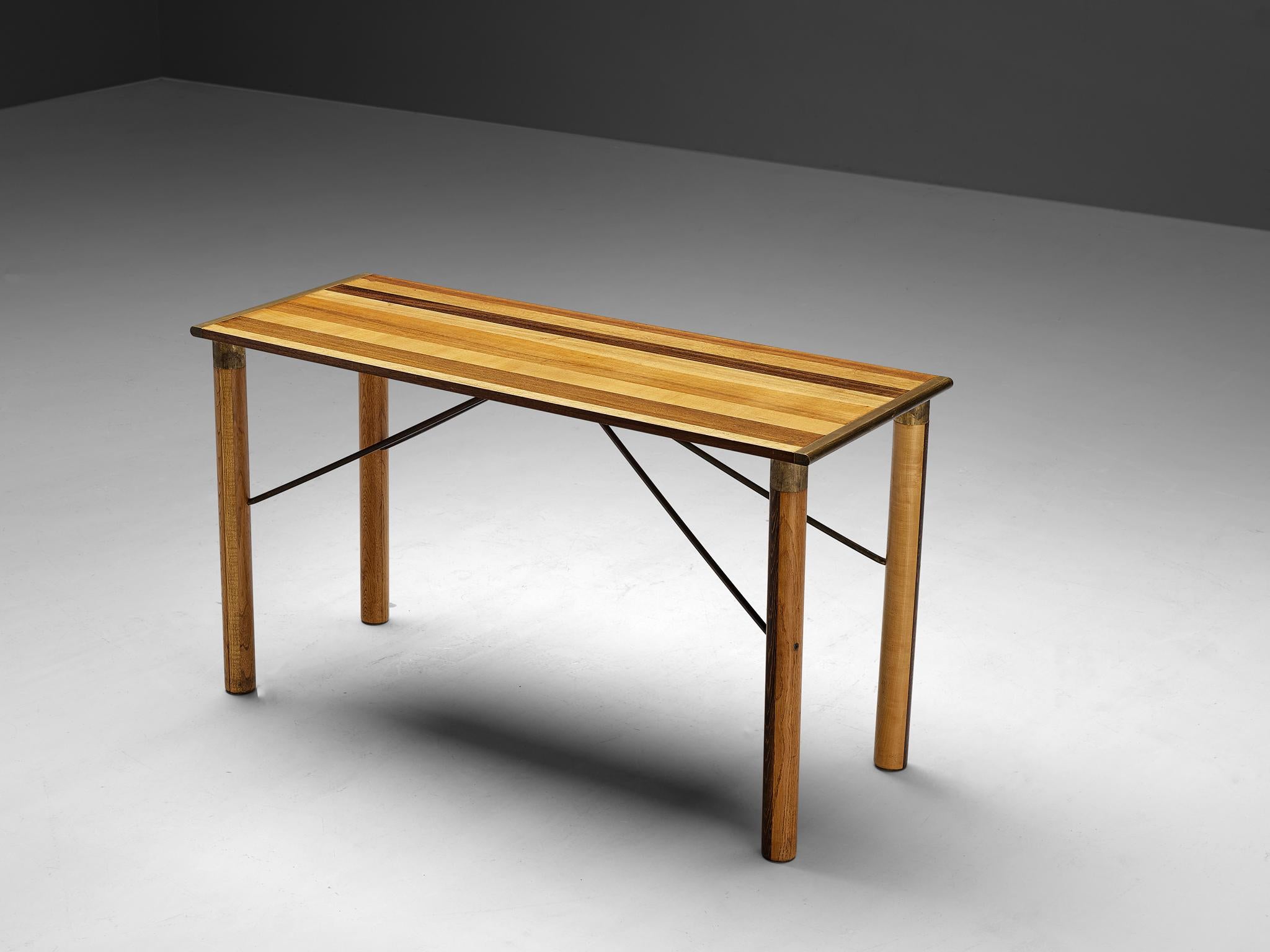 Afra & Tobia Scarpa for Benetton, console, walnut, wenge, ash, oak, brass, Italy, 1970s

We present this exquisitely crafted table designed by Afra and Tobia Scarpa for the Benetton shop. These tables embody excellence in every aspect - from form