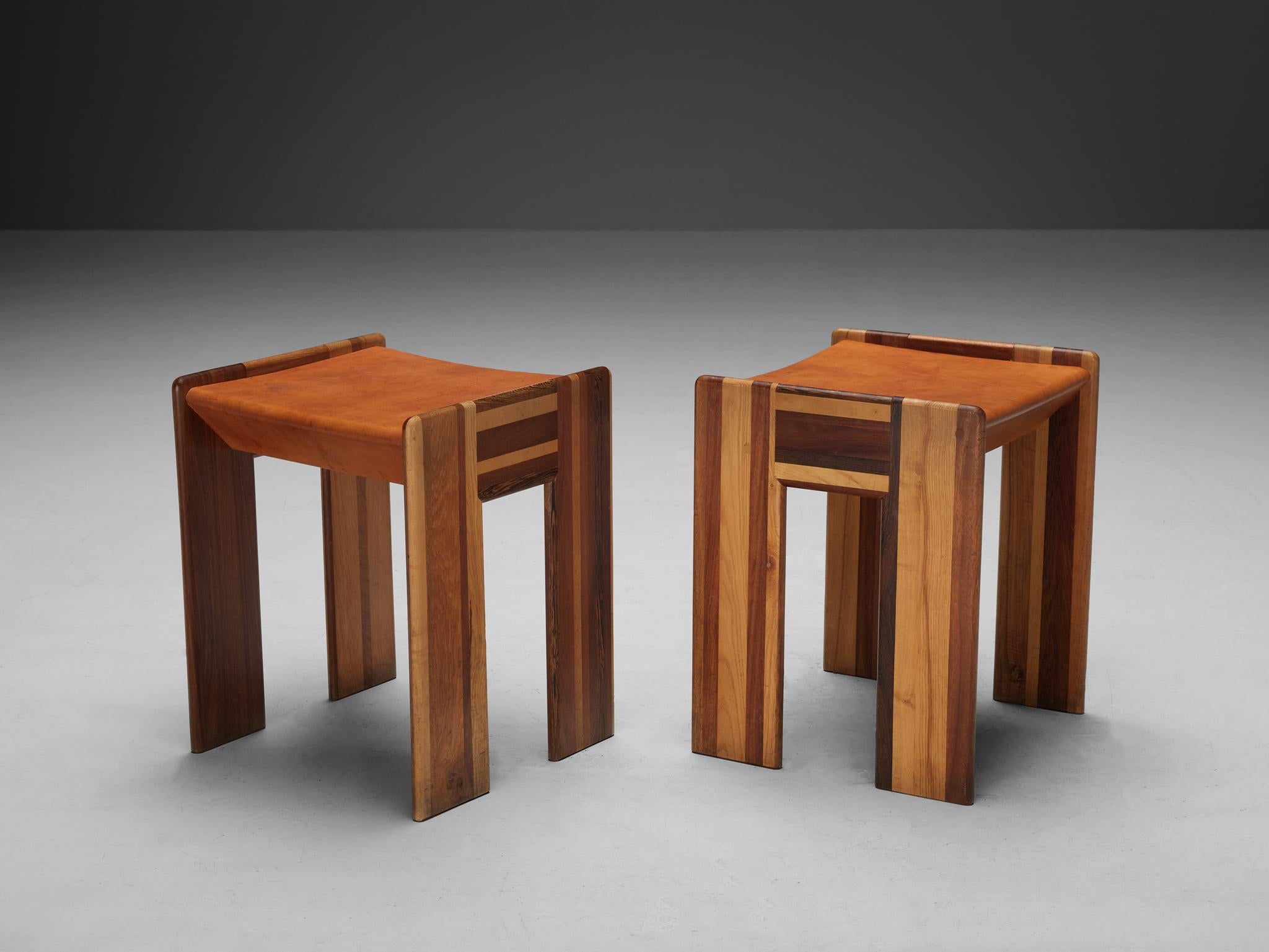 Afra & Tobia Scarpa for Benetton, stools, oak, walnut, wenge, ash, Italy, 1970s

We present exquisitely crafted stools designed by Afra and Tobia Scarpa for the Benetton shop. These chairs embody excellence in every aspect—from form and material