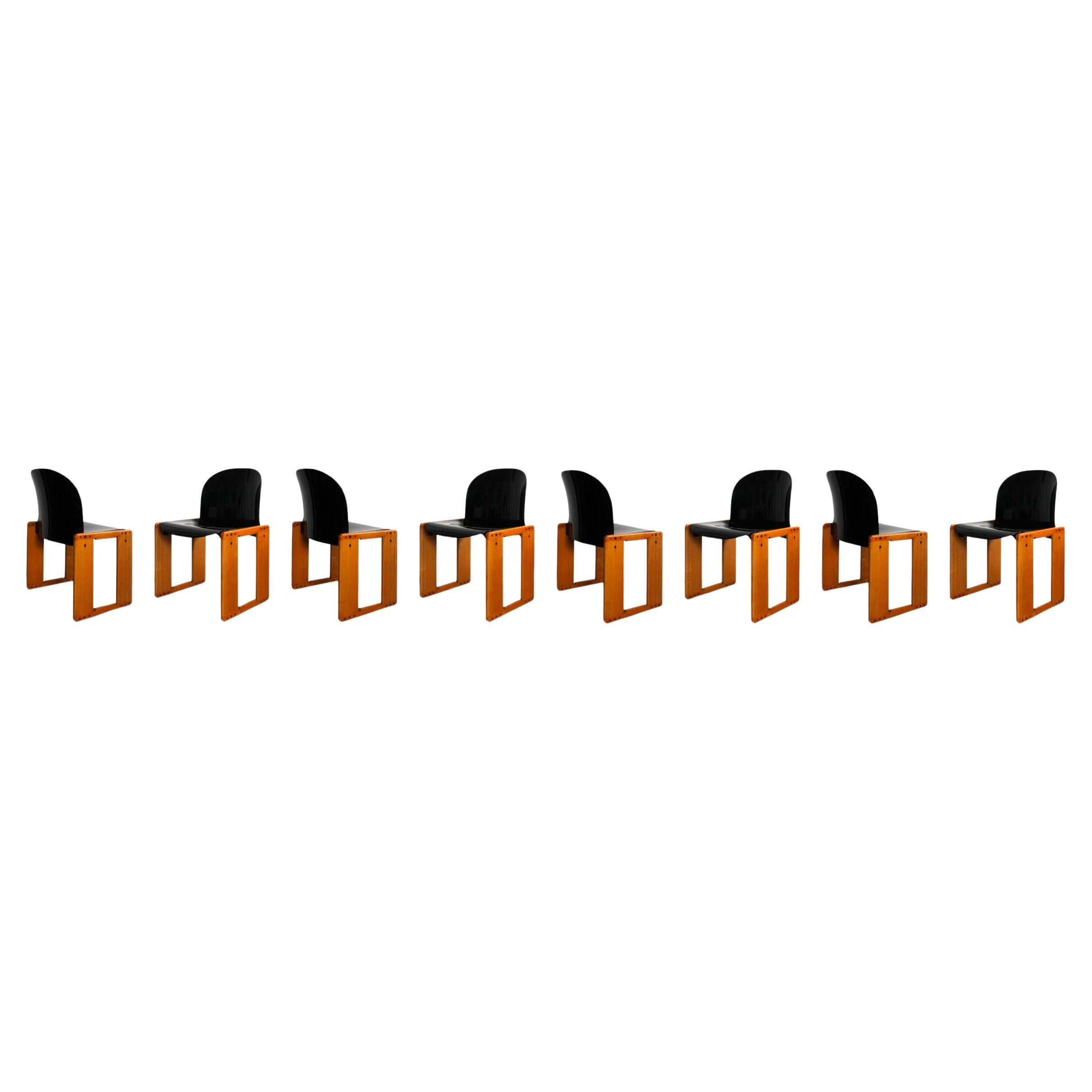 Set of Eight Dialogo Chairs Designed by Afra & Tobia Scarpa for B&B Italia, 1973

This set of eight Dialogo chairs features:
- Natural beechwood structure
- Black lacquered plastic seat
- Signature Scarpa double trestle design

Excellent vintage