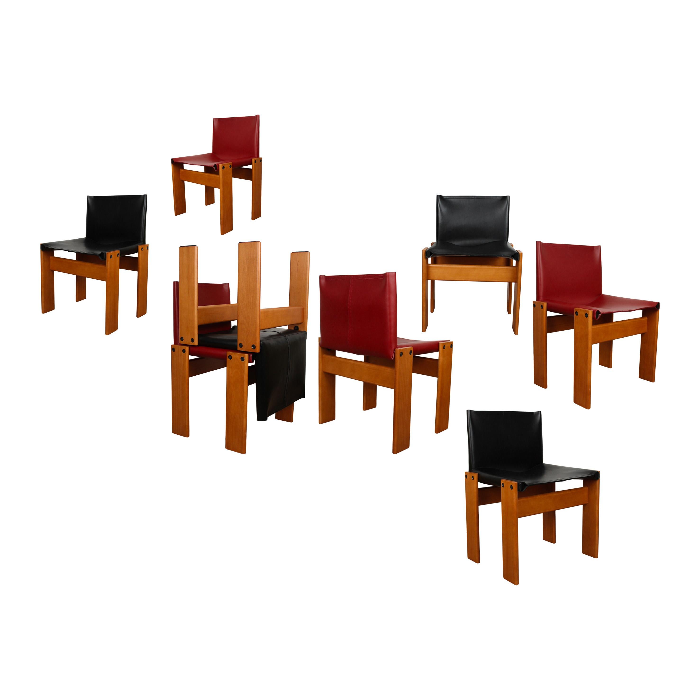 Set of eight “Monk” dining chairs designed by Afra and Tobia Scarpa for Molteni in 1973.
Made of English red and black leather and walnut.
Fully restored in Italy.

Interesting is the ‘flat’ shape of this chair where the designer has chosen to place