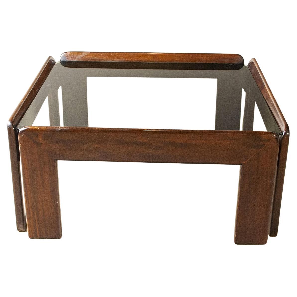 Coffee table wooden structure with smoked glass top 1970s production by Afra & Tobia Scarpa.
Afra and Tobia Scarpa are award-winning Italian postmodern architects and designers. Their pieces can be found in museums in the United States and Europe,