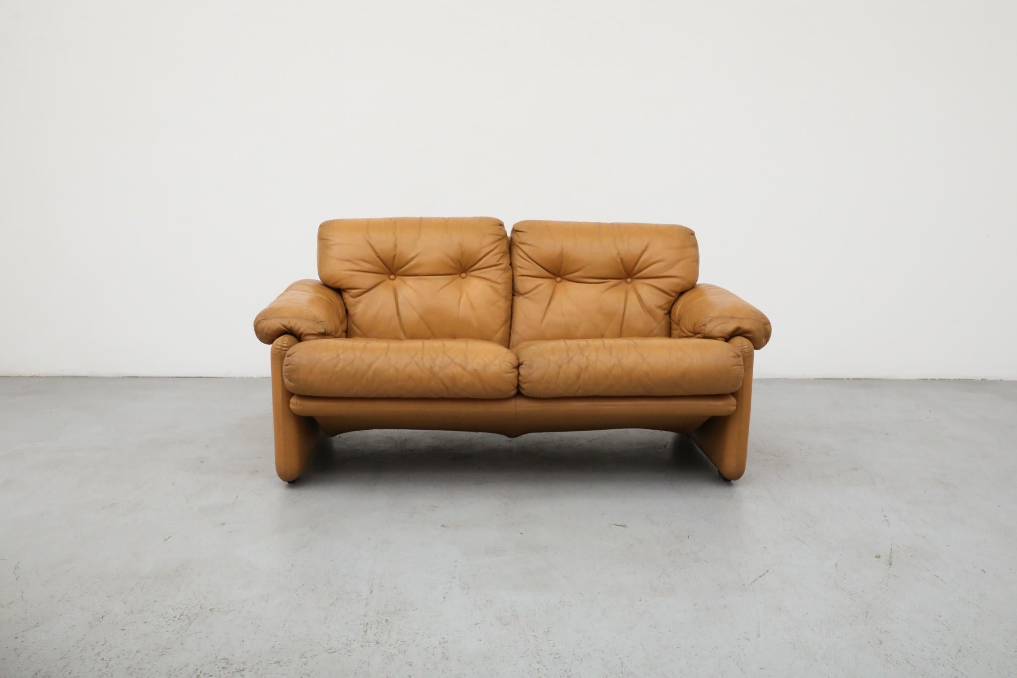 Original 'Coronado' loveseat in butterscotch leather, designed in 1966 by Afra & Tobia Scarpa for B&B Italia. A celebrated design from the golden era of Italian Mid-Century - offering exceptional comfort, visual softness, and architectural clarity.