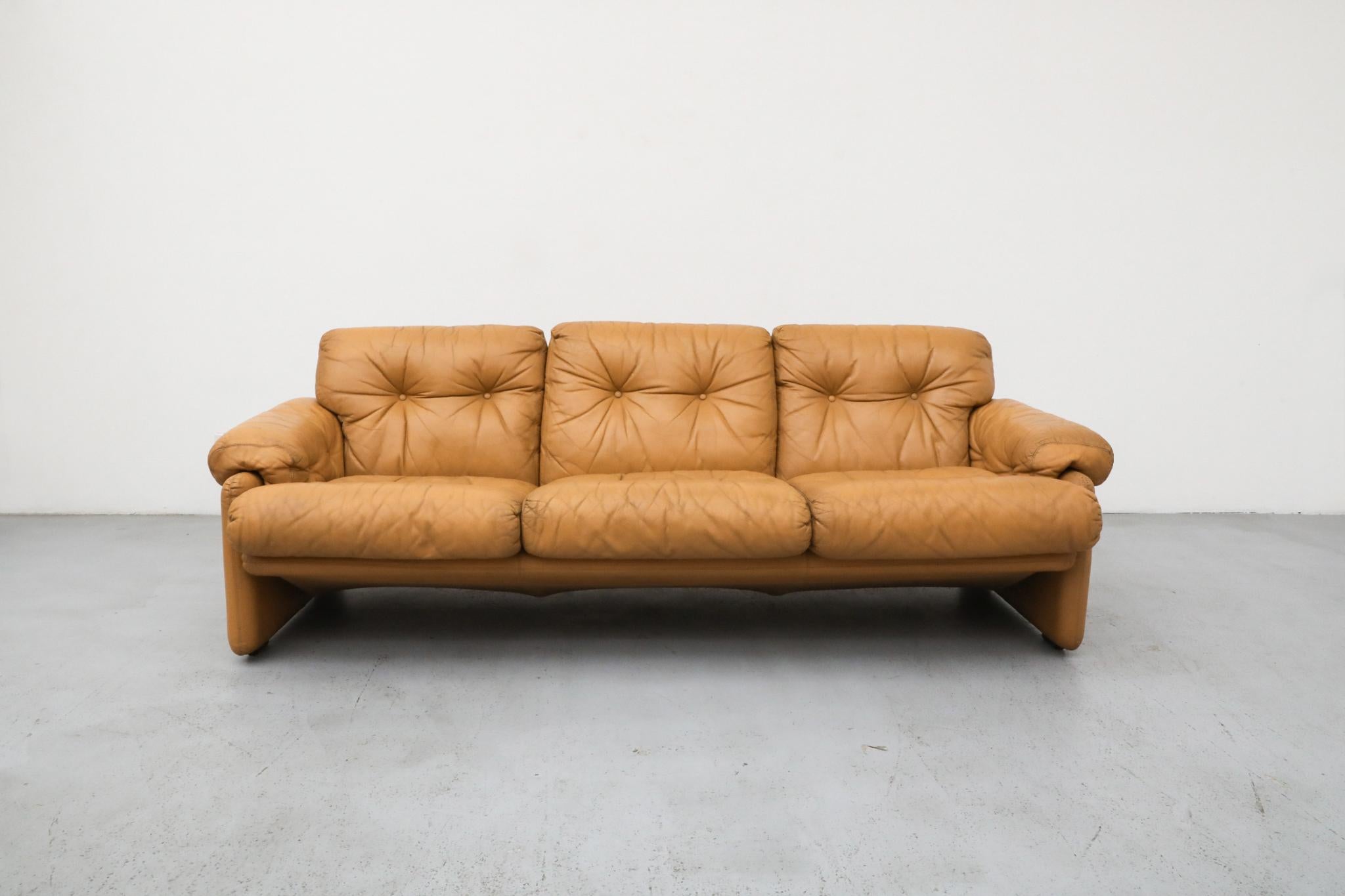 This iconic 'Coronado' three-seater sofa, a testament to the revolutionary Italian Mid-Century Modern movement, was designed by the esteemed duo Afra & Tobia Scarpa for the world-renowned B&B Italia in 1966. Its design masterfully bridges the gap