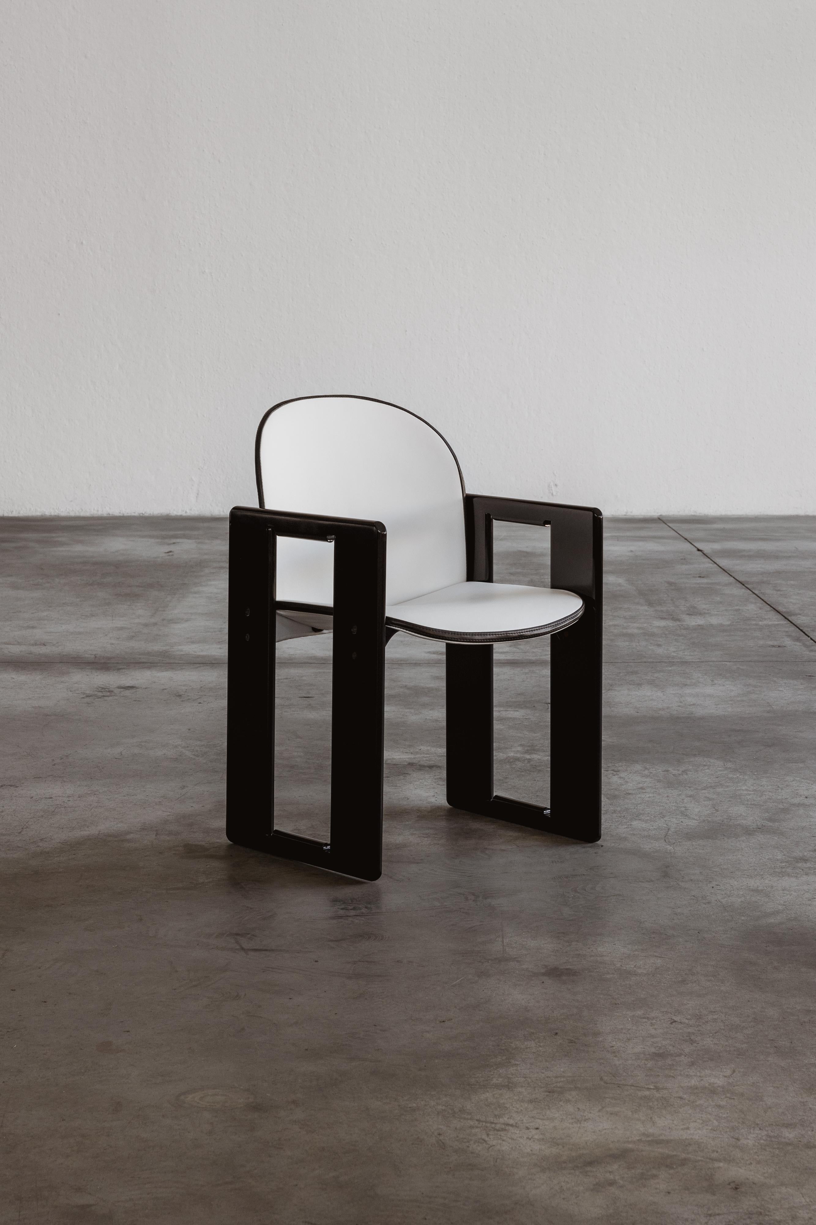 Afra & Tobia Scarpa “Dialogo” dining chair for B&B Italia, white leather and black walnut, Italy, 1973

The “Dialogo” chair is a return to the formal solution of the “121” chair. For the design of the structure the designers began by defining a