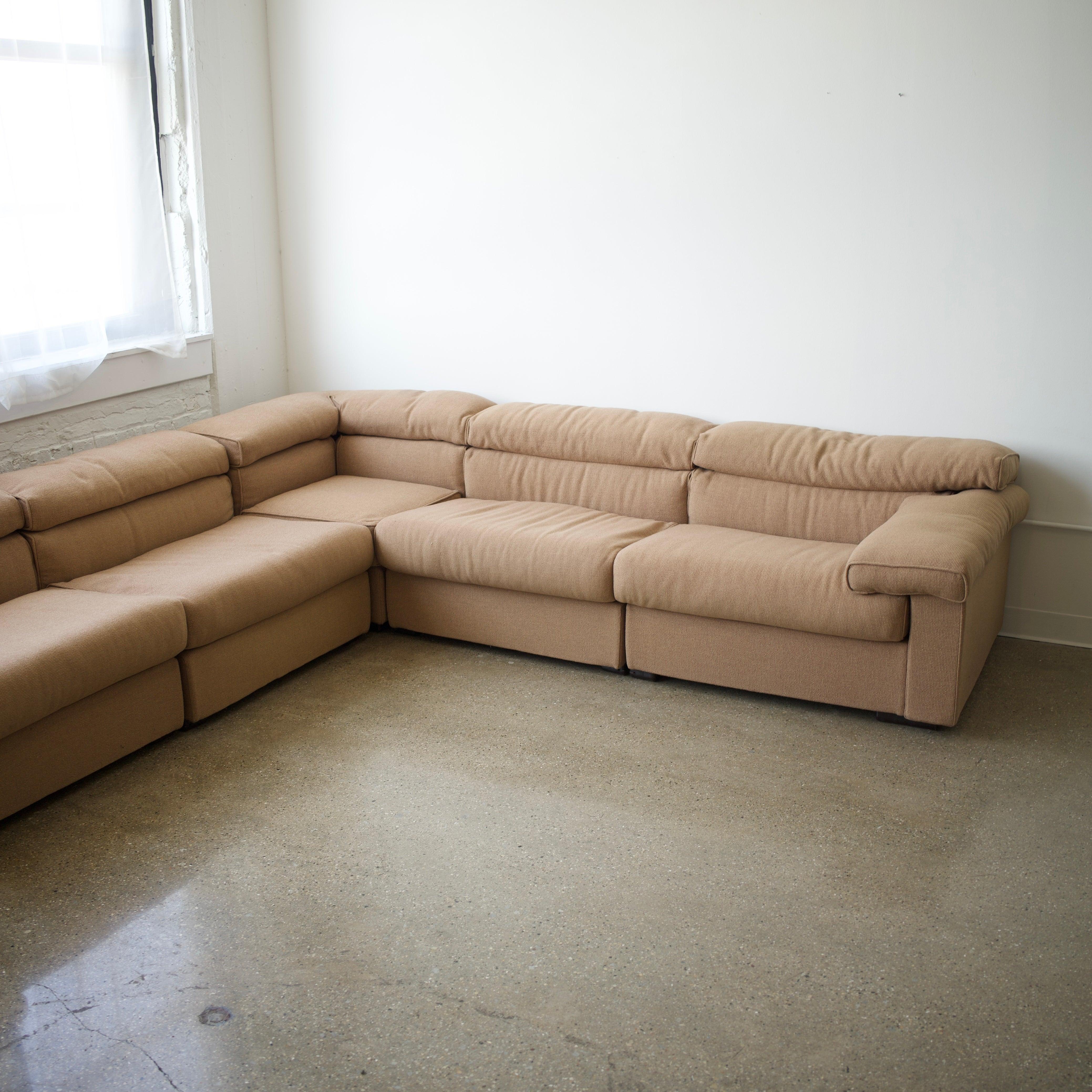 c. 1980s for B&B Italia in great vintage condition. This sofa features a modular design allowing you to rearrange the parts to extend individual sides. It’s incredibly comfortable. While the B&B Italia tags are not present, the importer (Atelier