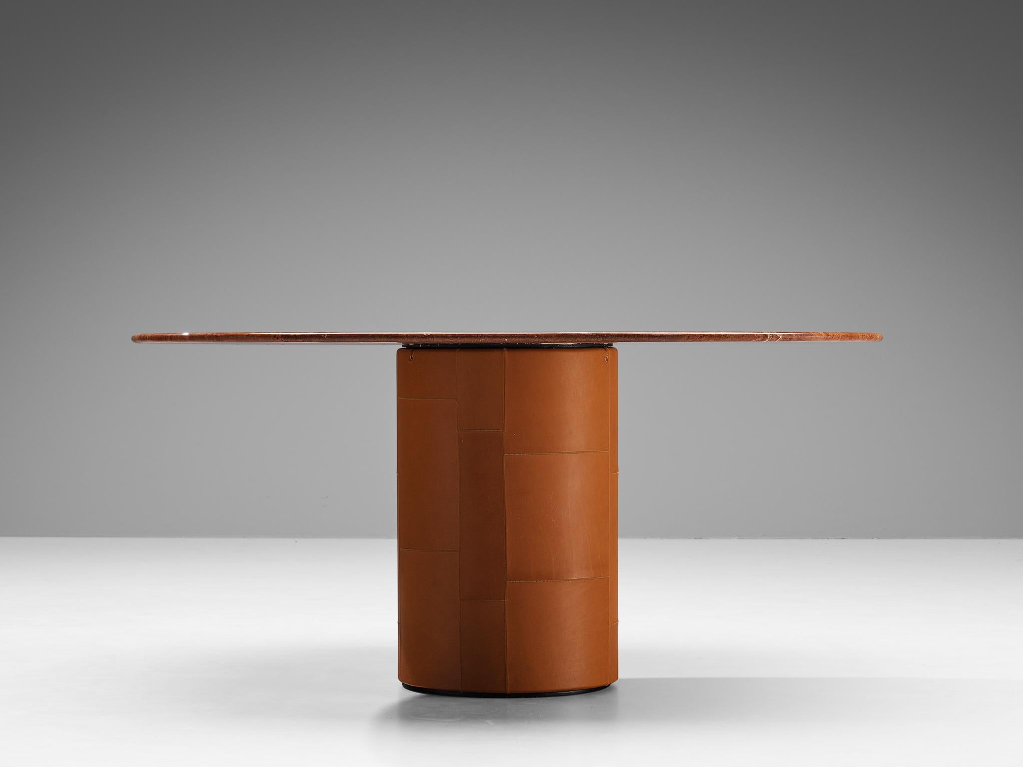 Afra & Tobia Scarpa for B&B Italia, 'Tobio' dining table, leather, travertine, Italy, design 1974

Gorgeous dining table designed by the iconic duo Afra and Tobia Scarpa. This table is made from a very beautiful red travertine. A glamorous