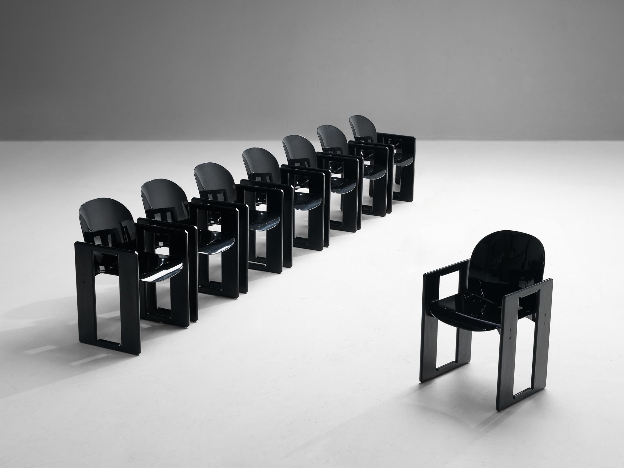 Afra and Tobia Scarpa for B&B Italia, set of eight ‘Dialogo’ dining chairs, black lacquered wood, fiberglass, Italy, 1970s
 
The ‘Dialogo’ dining chair was designed by Afra and Tobia Scarpa in the 1970s and convinces visually through its two angular