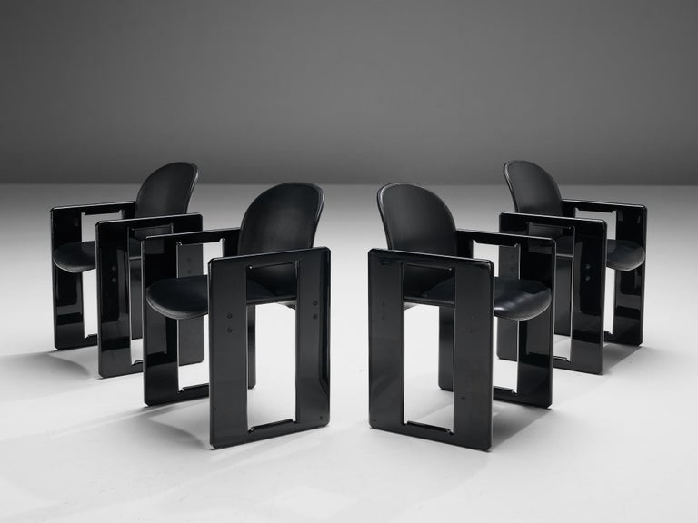 Afra and Tobia Scarpa for B&B, set of four ‘Dialogo’ dining chairs, black lacquered wood, leather, Italy, 1970s 

The ‘Dialogo’ dining chair was designed by Afra and Tobia Scarpa in the 1970s and convinces with its two angular frames where the