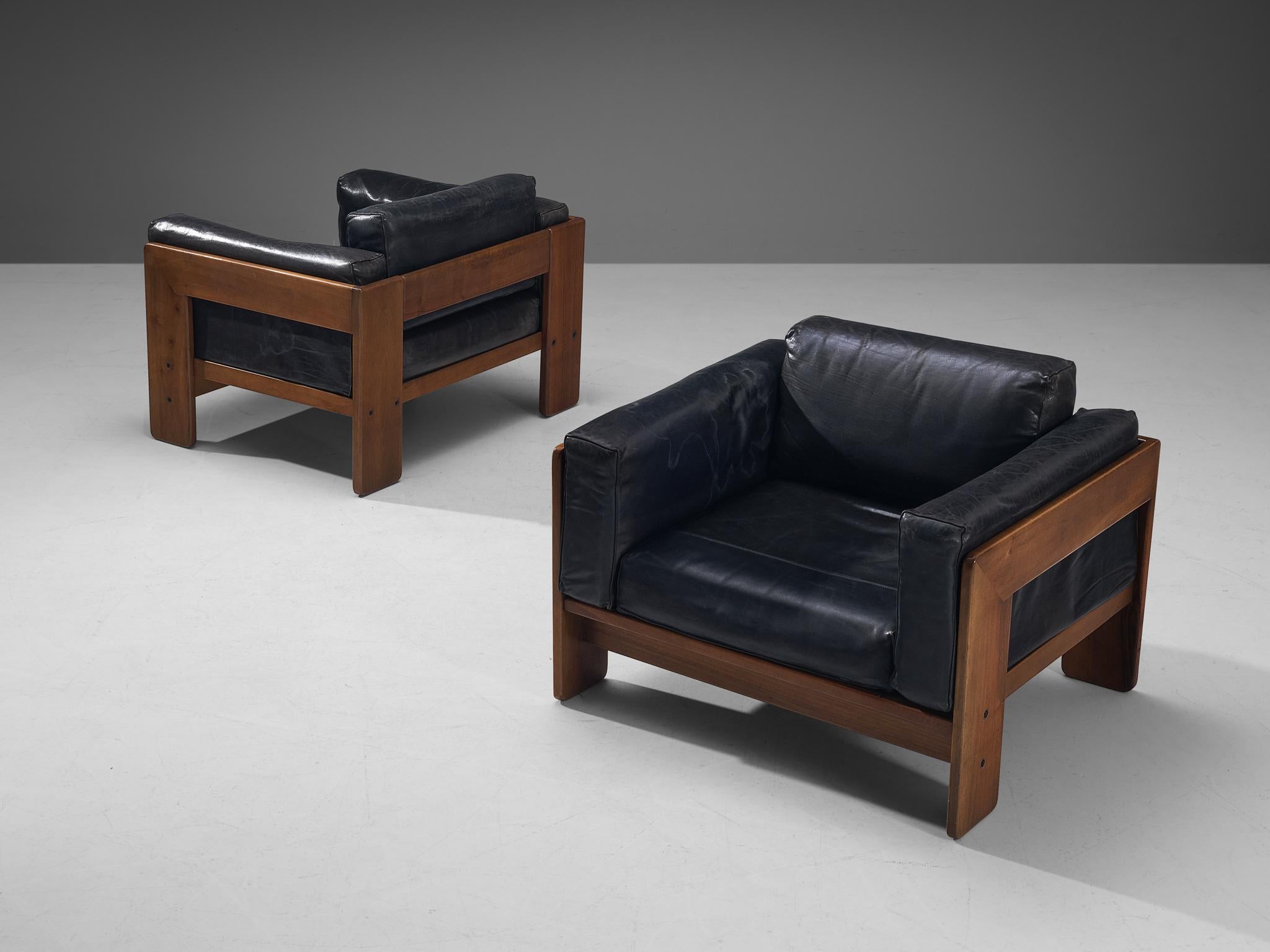 Afra & Tobia Scarpa for Knoll, 'Bastiano' lounge chairs, leather, walnut, Italy, design 1962

These delicate lounge chairs truly intensifies the experience of sitting itself and is a standout in any modern room. The lounge chair is well-designed