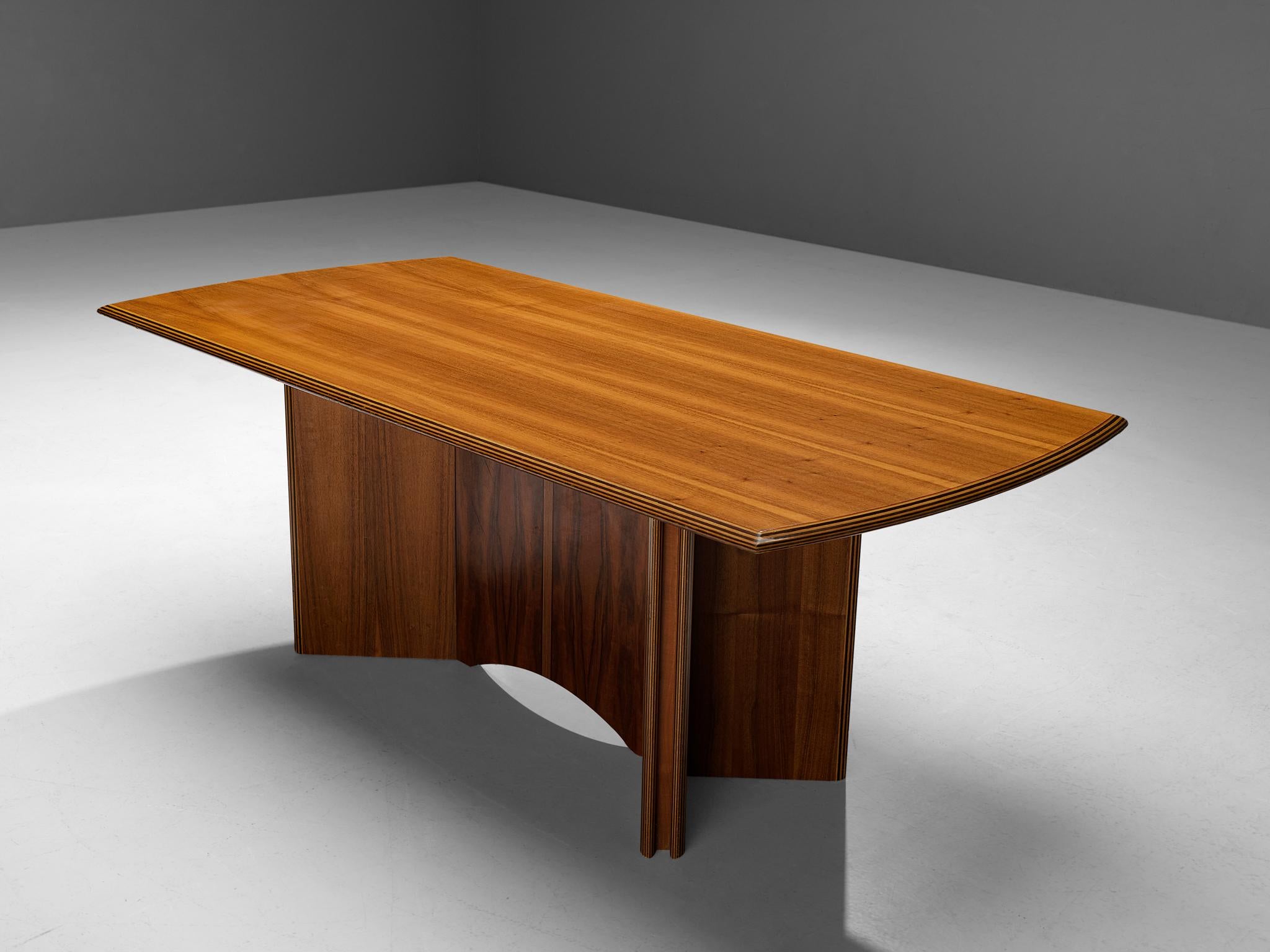 Afra & Tobia Scarpa for Maxalto, dining table model ‘Artona’, walnut, Italy, 1975/1979

This table was designed by Afra & Tobia Scarpa within the ‘Artona’ line for Maxalto. This particular model is rare. The architectural base is composed of two