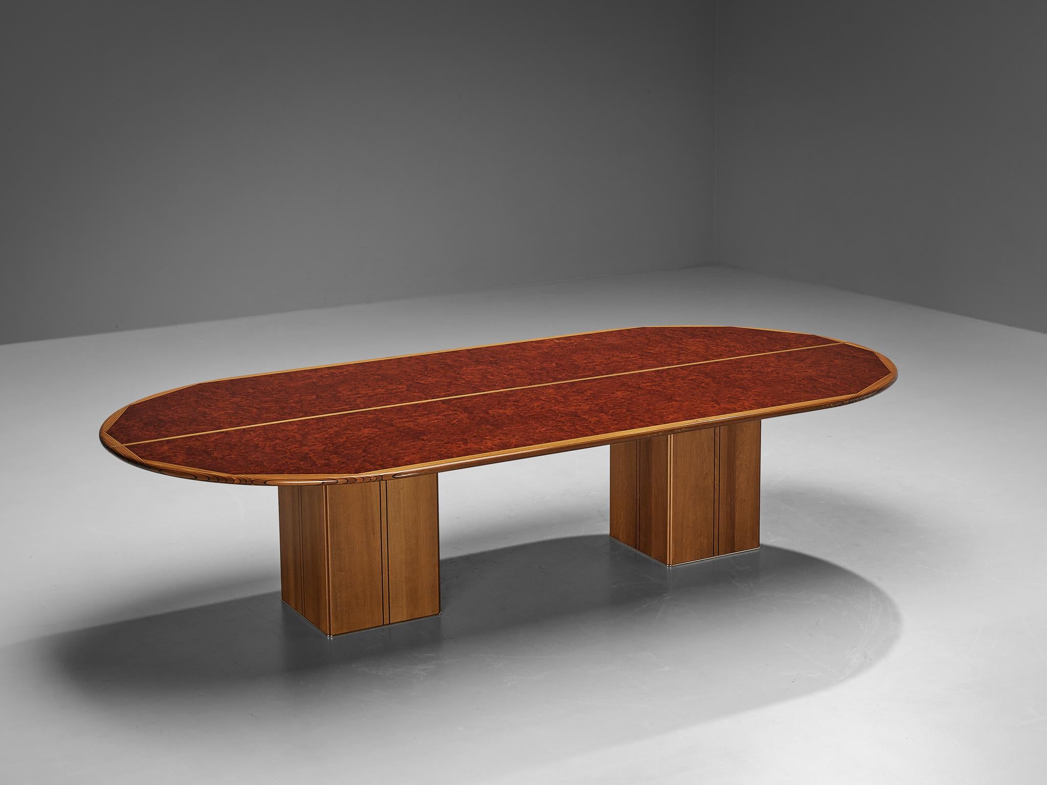 Afra & Tobia Scarpa for Maxalto, large oval dining table model ‘Artona’, walnut, walnut burl, ebony, brass, Italy, 1975/1979

Intriguing table designed by Afra and Tobia Scarpa. On two squared pedestal base rests an oval tabletop. The top shows