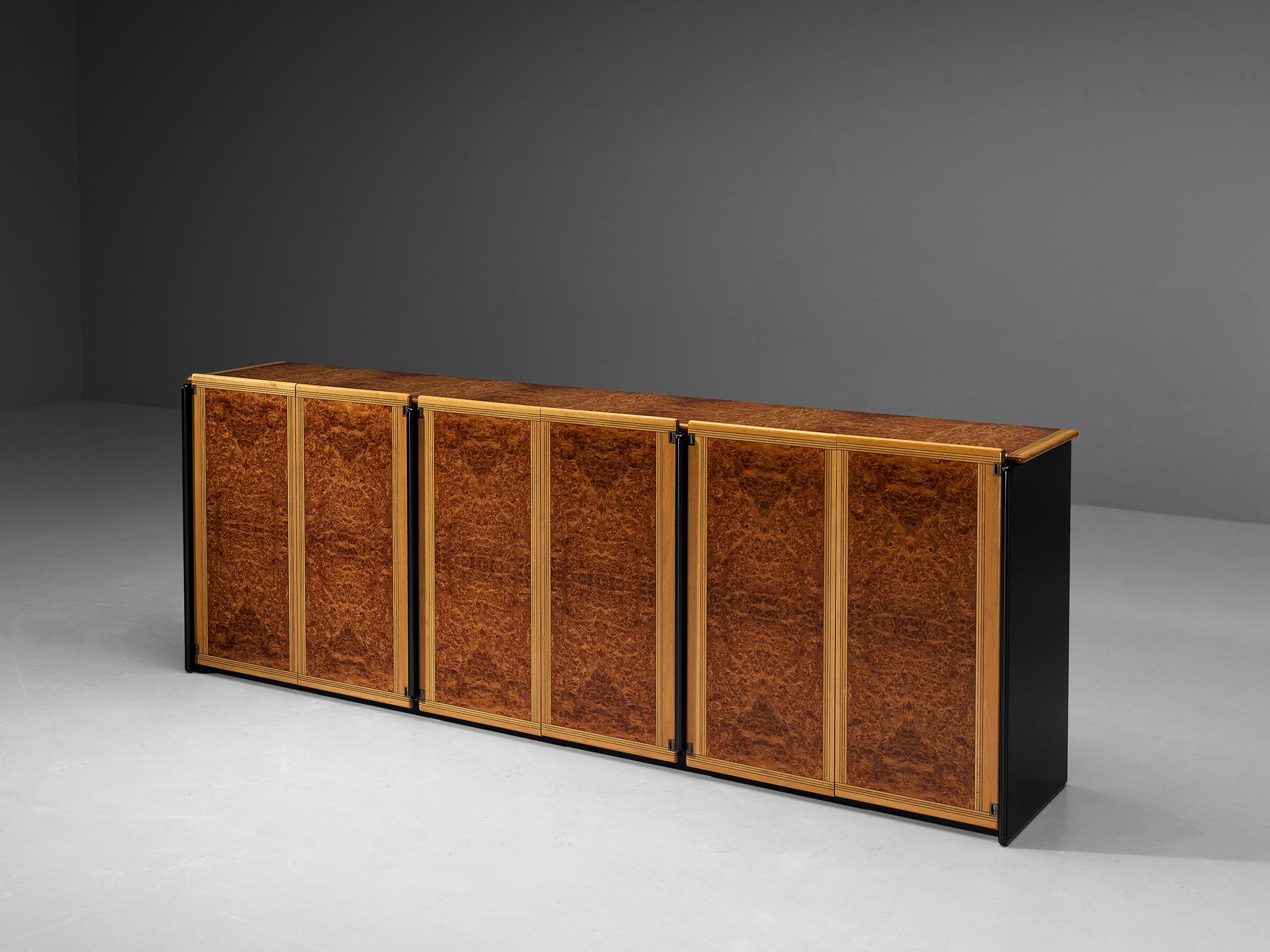 Afra & Tobia Scarpa for Maxalto, sideboard, mahogany, mahogany burl, Italy, circa 1975.

This sideboard with strong geometrical lines is designed as part of the ‘Artona’ line by Afra & Tobia Scarpa. The six front panels as well as the top are