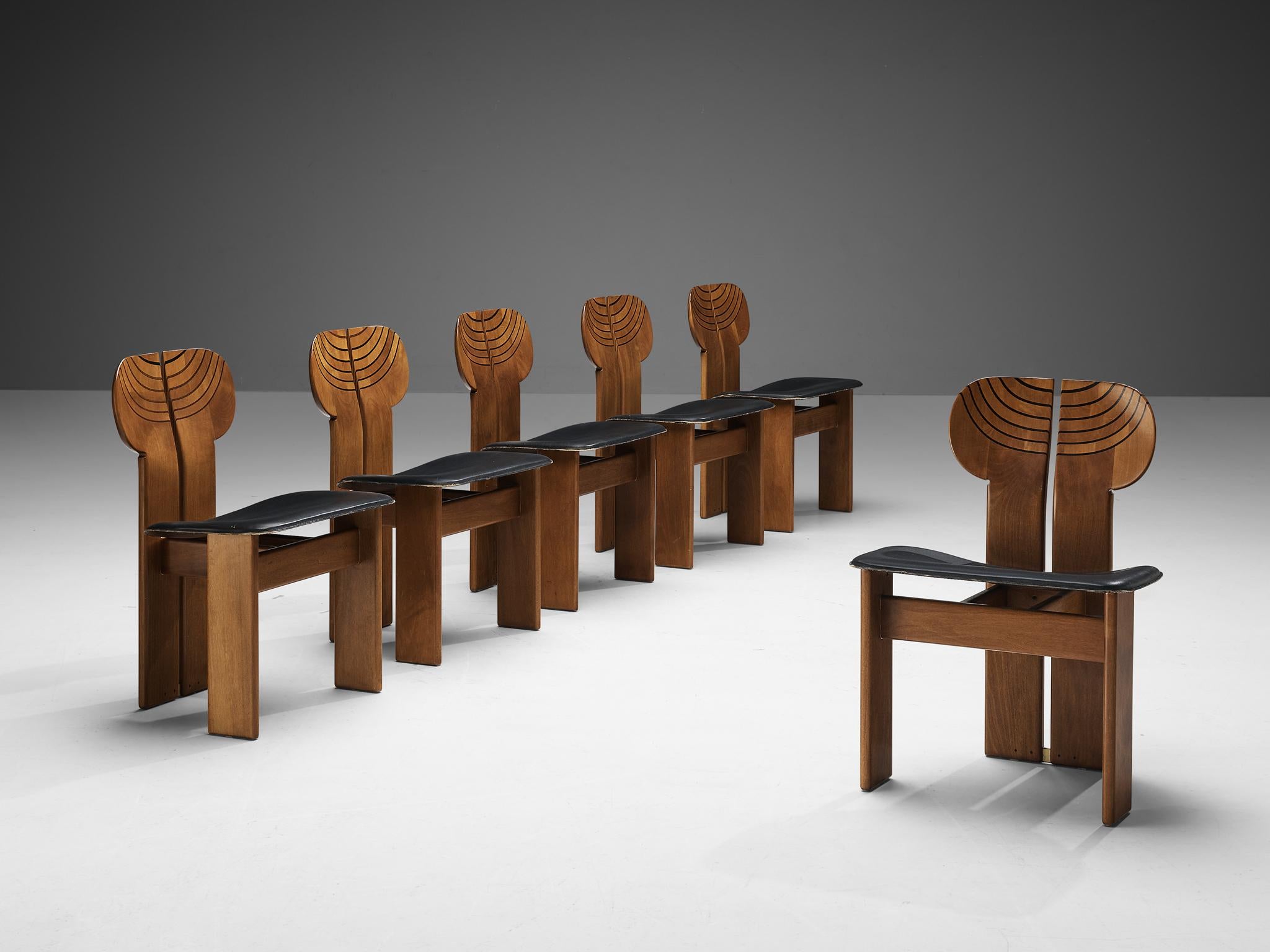 Afra & Tobia Scarpa for Maxalto, set of six dining chairs model 'Africa', black leather, in walnut, ebony and brass, Italy, 1975.

This set of 'Africa' chairs explicitly sculptural grand chairs is designed by Afra & Tobia Scarpa. They are part of