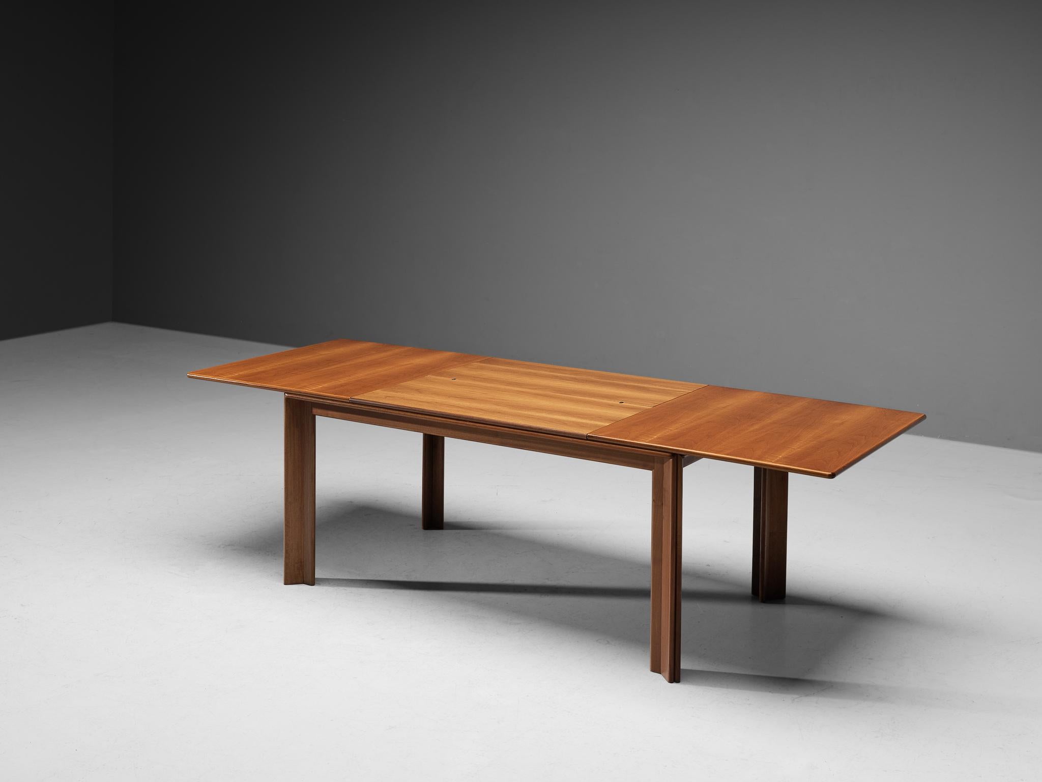 Afra & Tobia Scarpa for Molteni, extendable dining table, walnut, Italy, 1970s

Functional table designed by Afra & Tobia Scarpa for Molteni. The table is executed in beautiful and warm Italian walnut wood. The top is extendable with two leaves