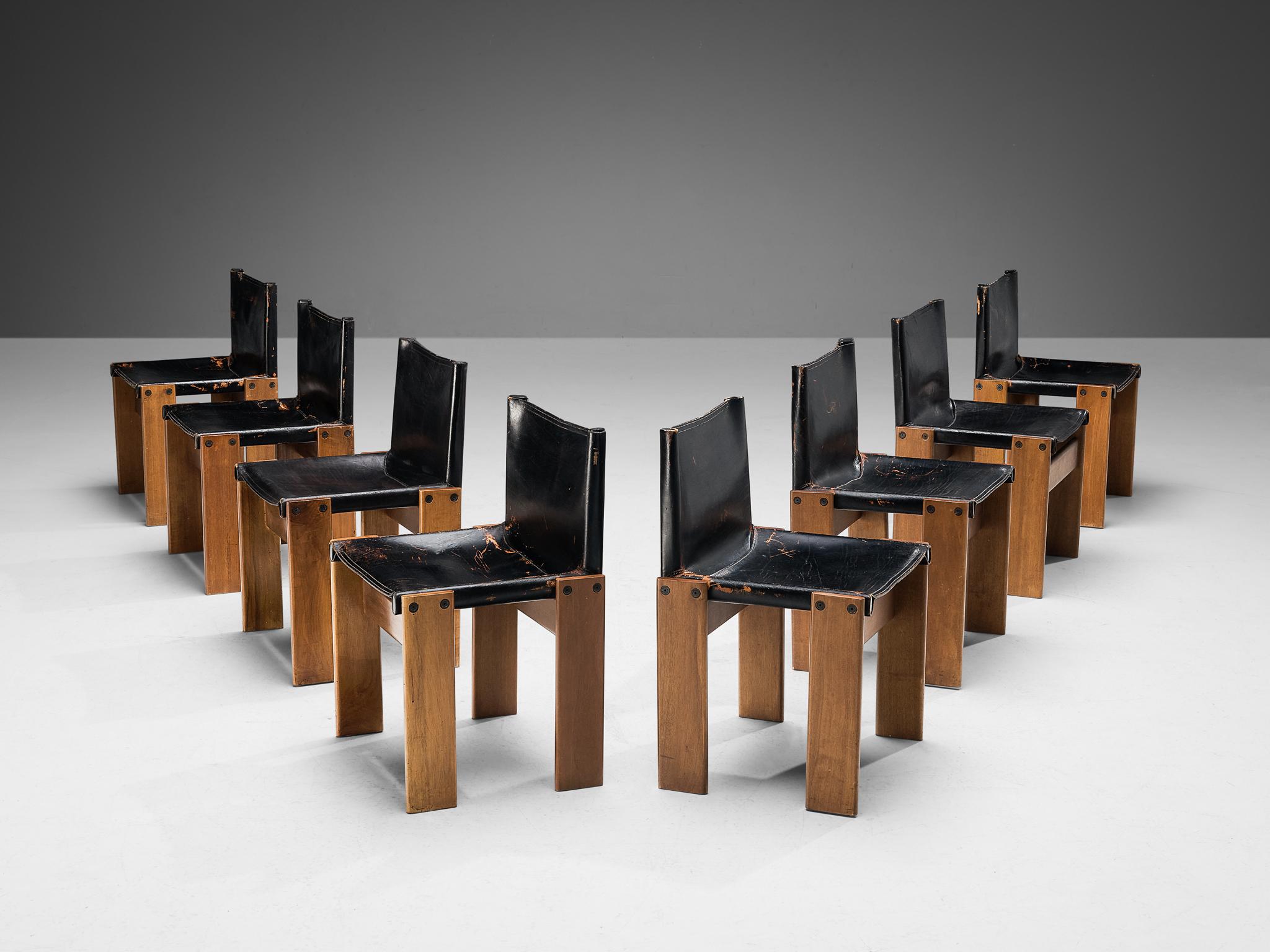 Afra & Tobia Scarpa for Molteni, 'Monk' dining chairs, walnut, leather, Italy, 1974.

Set of eight 'Monk' chairs by Italian designers Afra & Tobia Scarpa. The black leather shows beautiful patina and forms a striking combination with the walnut