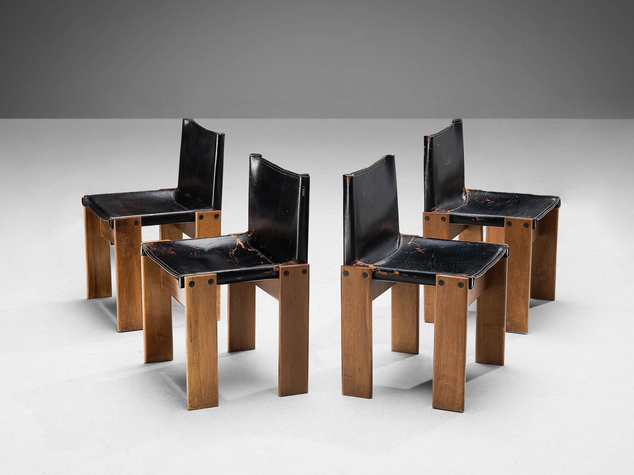 Afra & Tobia Scarpa for Molteni, set of four 'Monk' dining chairs, walnut, leather, Italy, 1974.

Set of four 'Monk' chairs by Italian designers Afra & Tobia Scarpa. The black leather shows beautiful patina and forms a striking combination with