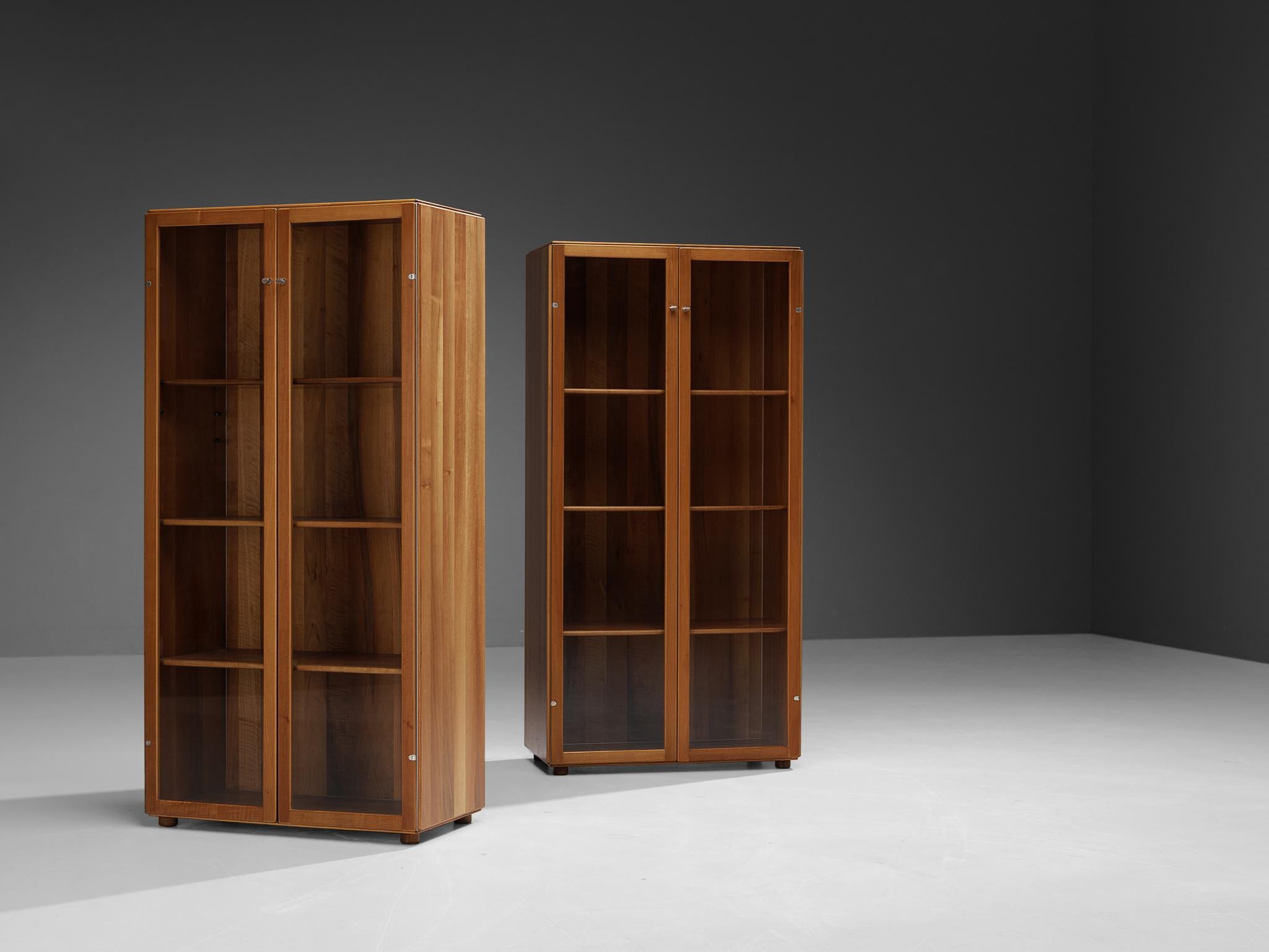 Afra & Tobia Scarpa for Stildomus, showcases model 'Torcello', walnut, glass, brass, metal, Italy 1963. 

This pair of showcases is designed by the iconic duo Afra and Tobia Scarpa. These pieces feature a design that allows the owner to display