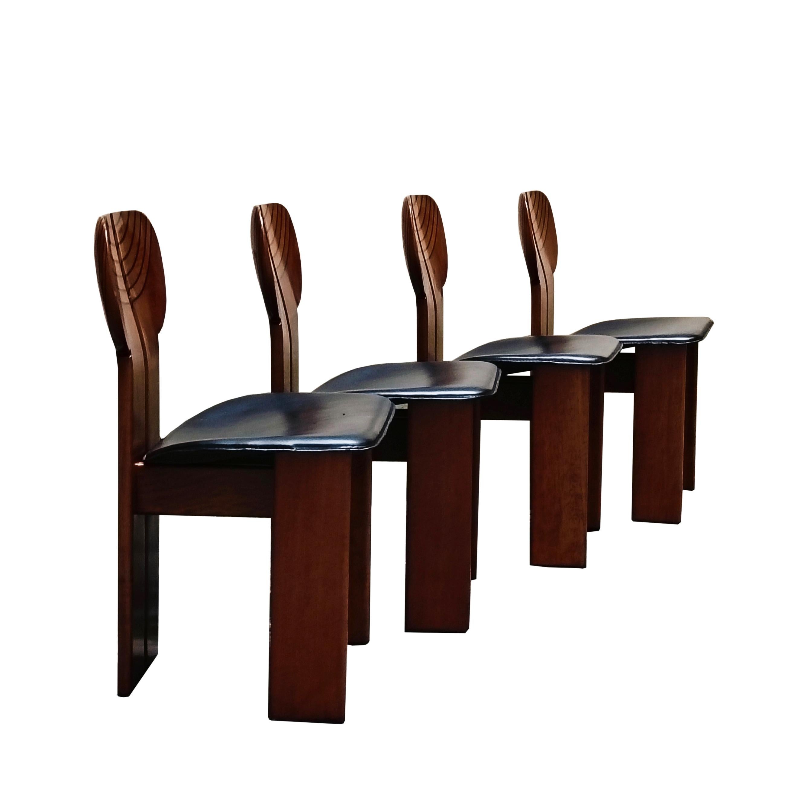 Original vintage Africa chairs by Afra & Tobia Scarpa.
First designed in 1975, these chairs were produced in 1985.
Solid walnut frames with ebony inlays and brass details, original black leather upholstery. Wooden frames in near perfect and original