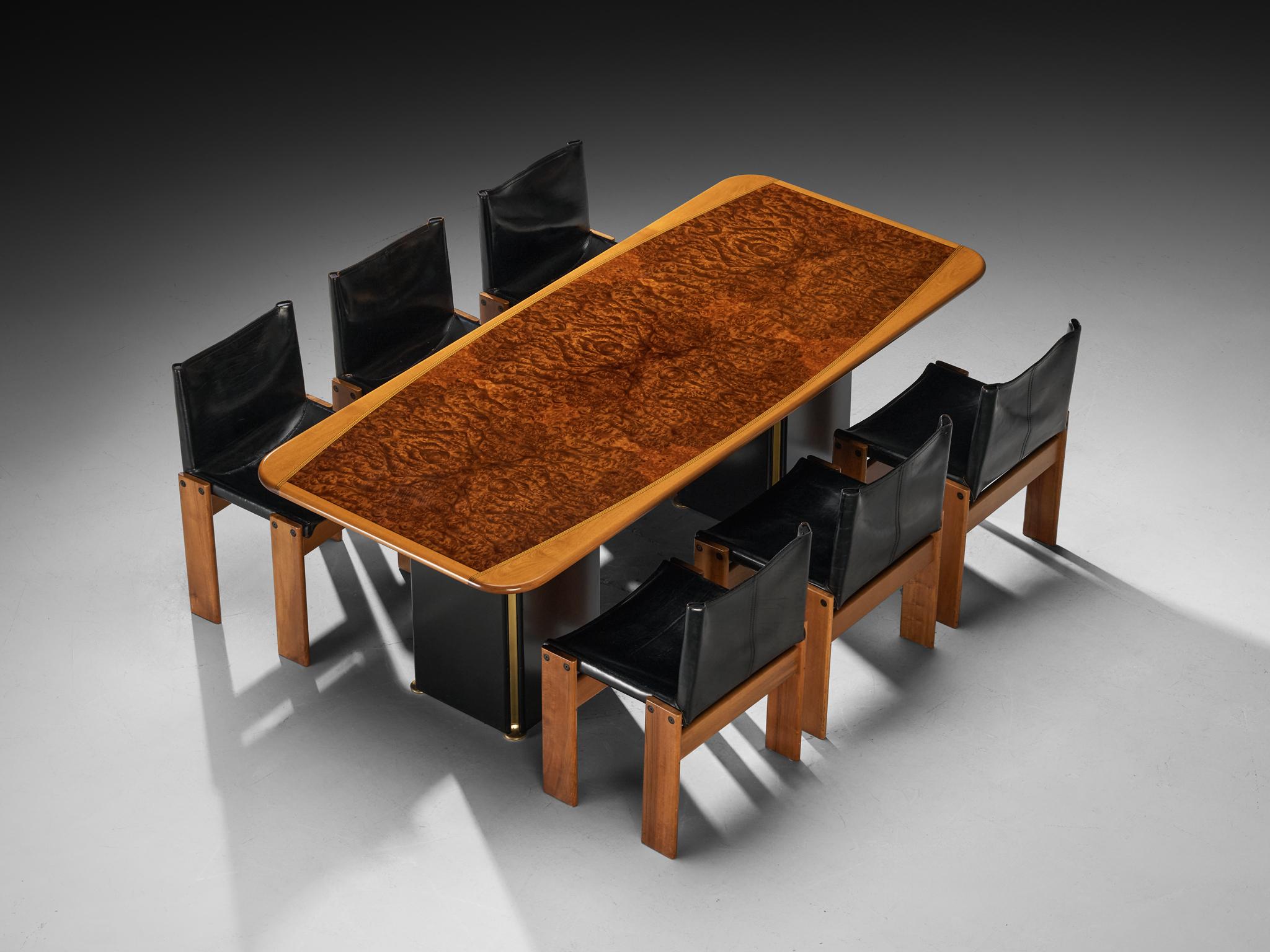 Dining room set consisting of Artona dining table with set of six Monk dining chairs by Afra & Tobia Scarpa. 


Afra & Tobia Scarpa for Maxalto, 'Artona' dining table, walnut, walnut burl, lacquered wood, brass, ebony, Italy, 1975/1979 

This table