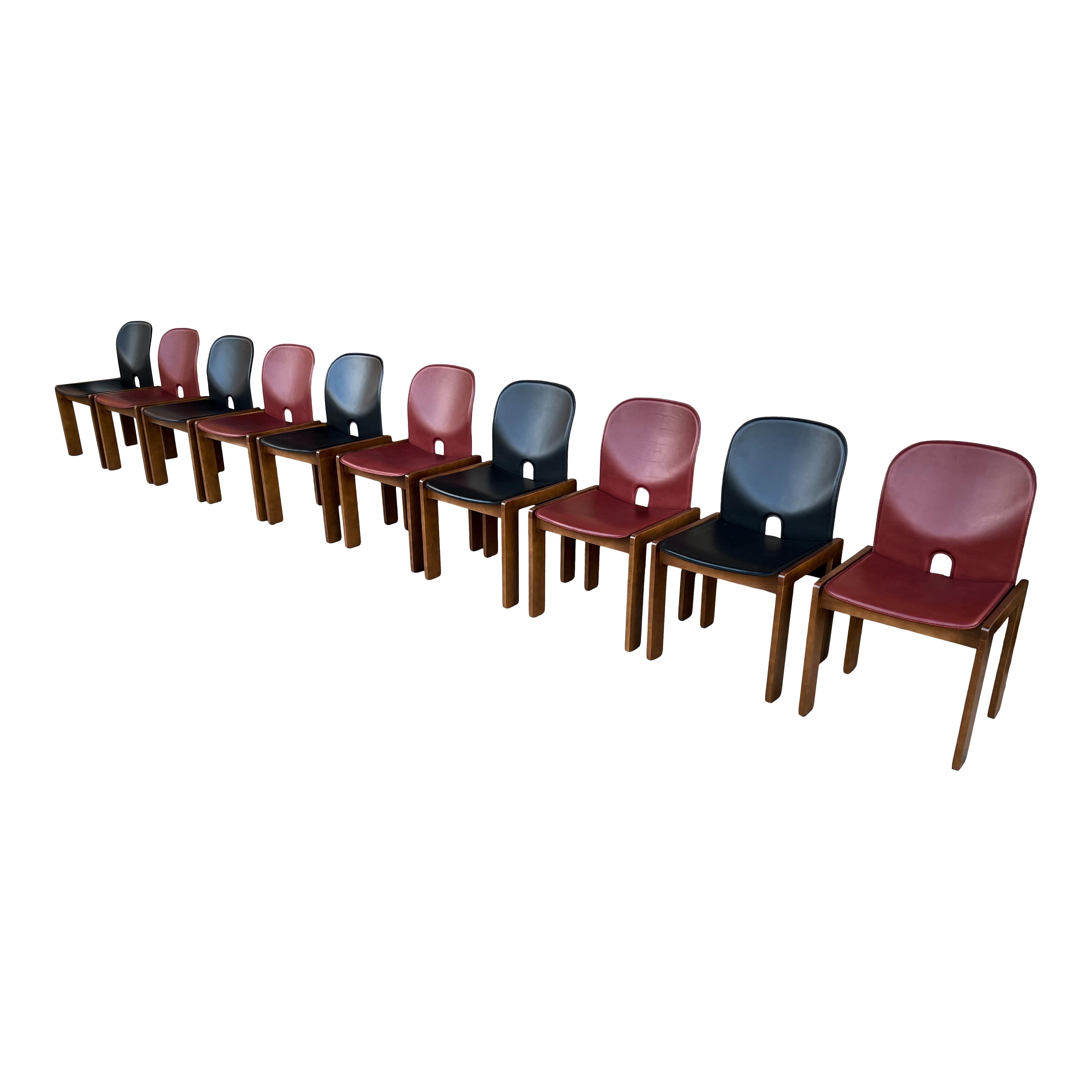 Set of ten Model 121 dining chairs, designed by Afra and Tobia Scarpa and produced by the Italian manufacturer Cassina in 1967.
They feature black and English red leather upholstery and a walnut structure.
Fully restored in Italy.

Afra and