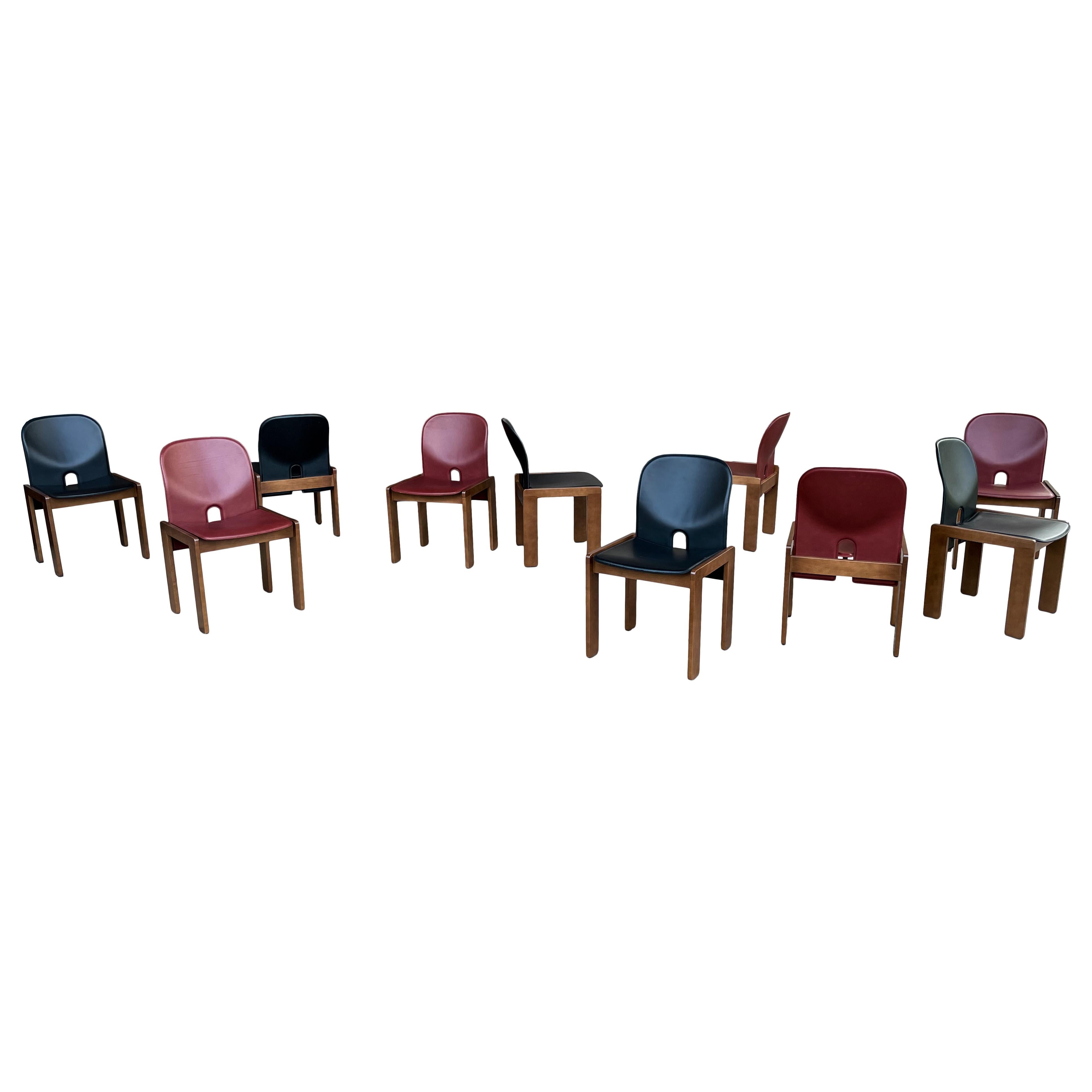 Set of eight Model 121 dining chairs, designed by Afra and Tobia Scarpa and produced by the Italian manufacturer Cassina in 1967.
They feature black and English red leather upholstery and a walnut structure.
Fully restored in Italy.

Afra and Tobia