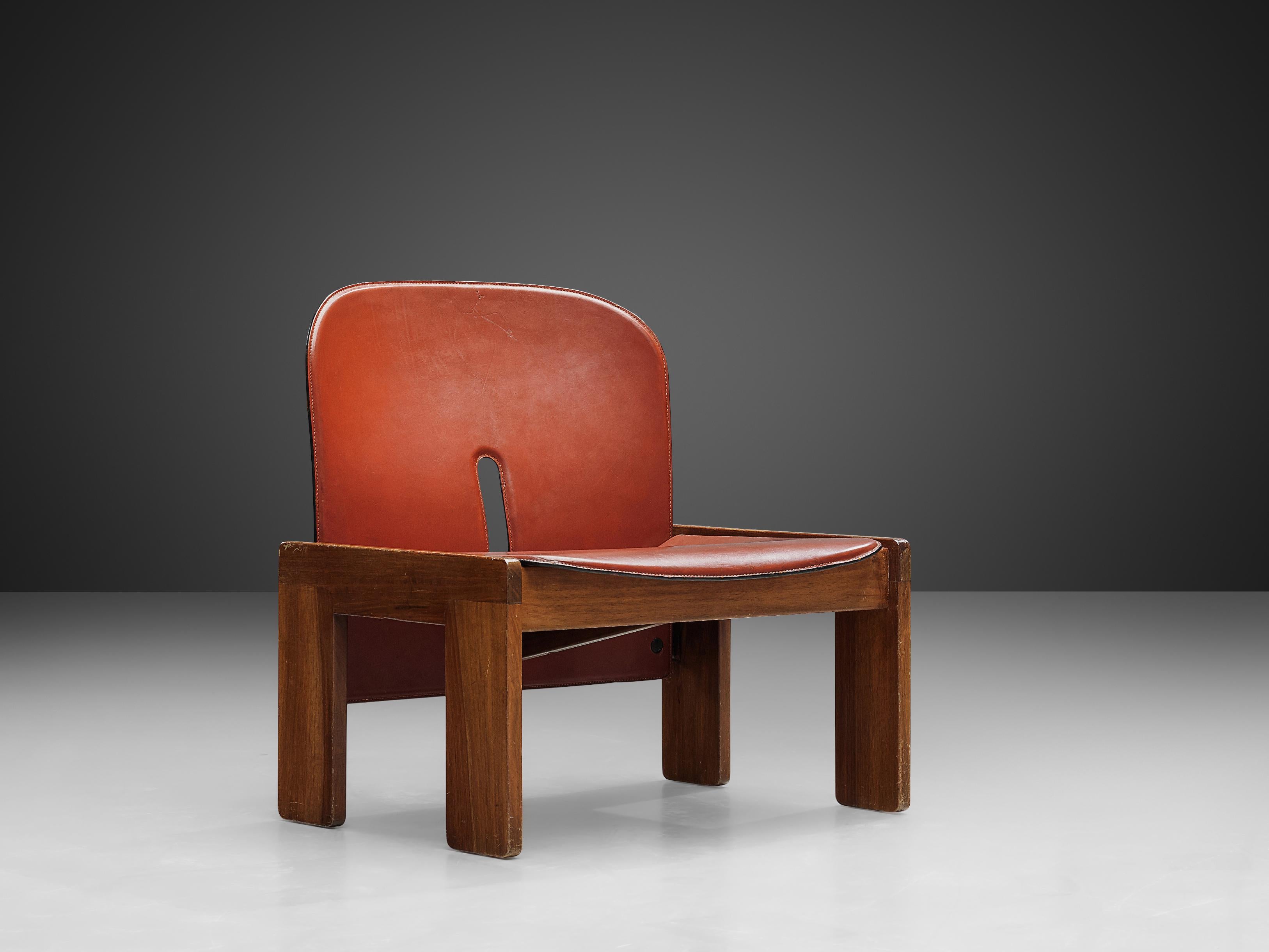 Afra & Tobia Scarpa for Cassina, '925' easy chair, walnut and leather, Italy, 1966.

Model '925' lounge chair by Italian designer couple Tobia and Afra Scarpa. This low chair has a cubic and architectural appearance. The base consist of four