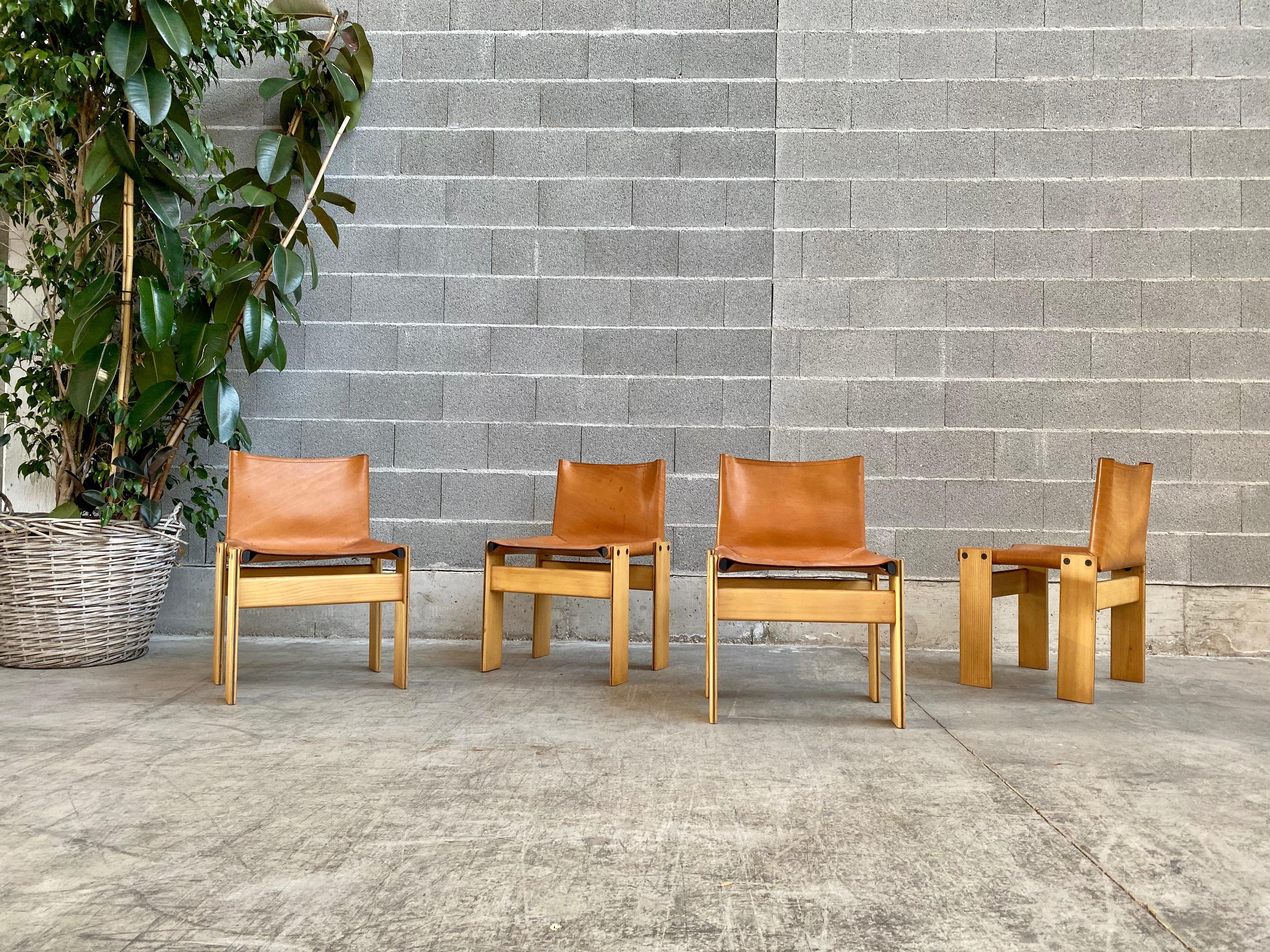 Afra & Tobia Scarpa “Monk” dining chairs for Molteni, Set of 4.

Set of 4 cognac leather “Monk” dining chairs designed by Afra & Tobia Scarpa for Molteni, 1973. 
Excellent condition. The cognac leather have a great patina, just few and slight