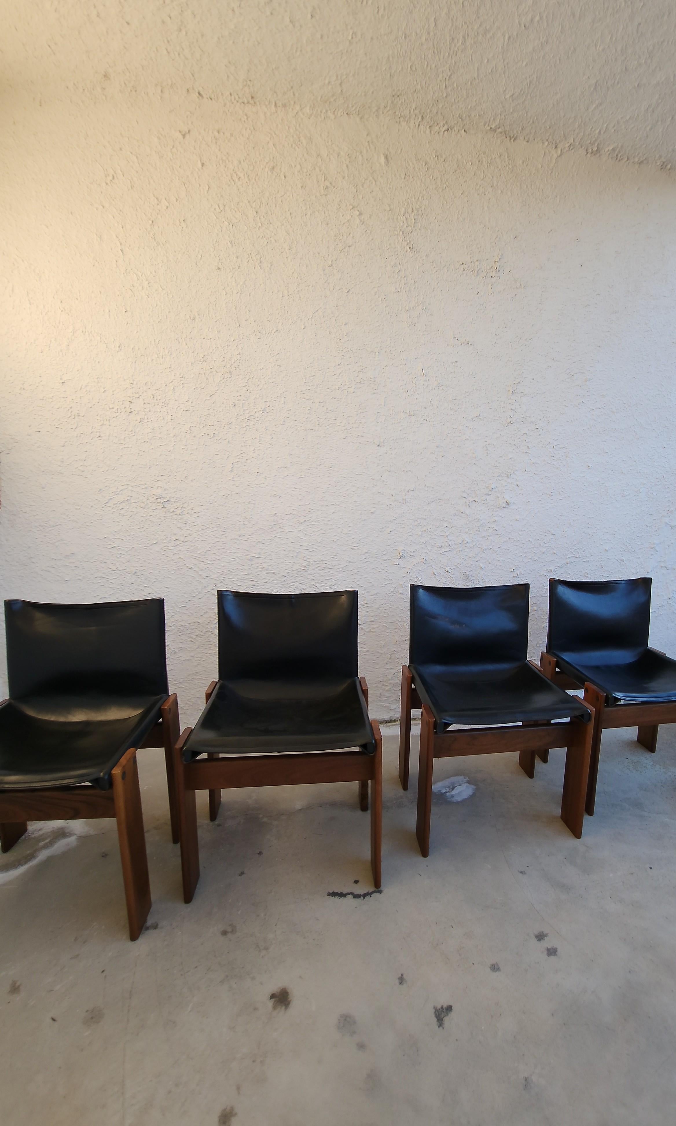 Beautiful set of vintage monk chairs produced by Molteni in 1974
The chairs are in pristine conditions, the patina of the wood is pleasantly visible, testimony of their age. 
The set will be consigned  refinished by our expert.
 