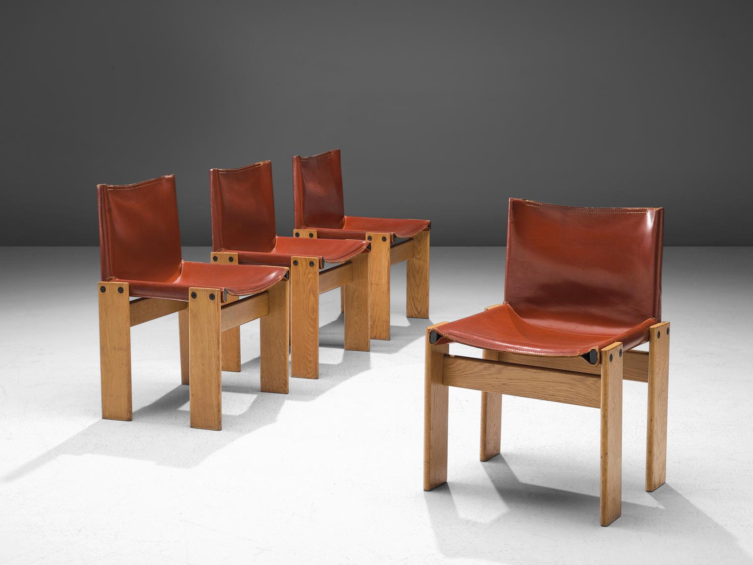Afra & Tobia Scarpa, set of four 'Monk' dining chairs, patinated teak and red leather, Italy, 1974.

The wonderfully red leather forms a striking combination with the blond wood. Interesting is the 'flat' shape of this chair where the designer has
