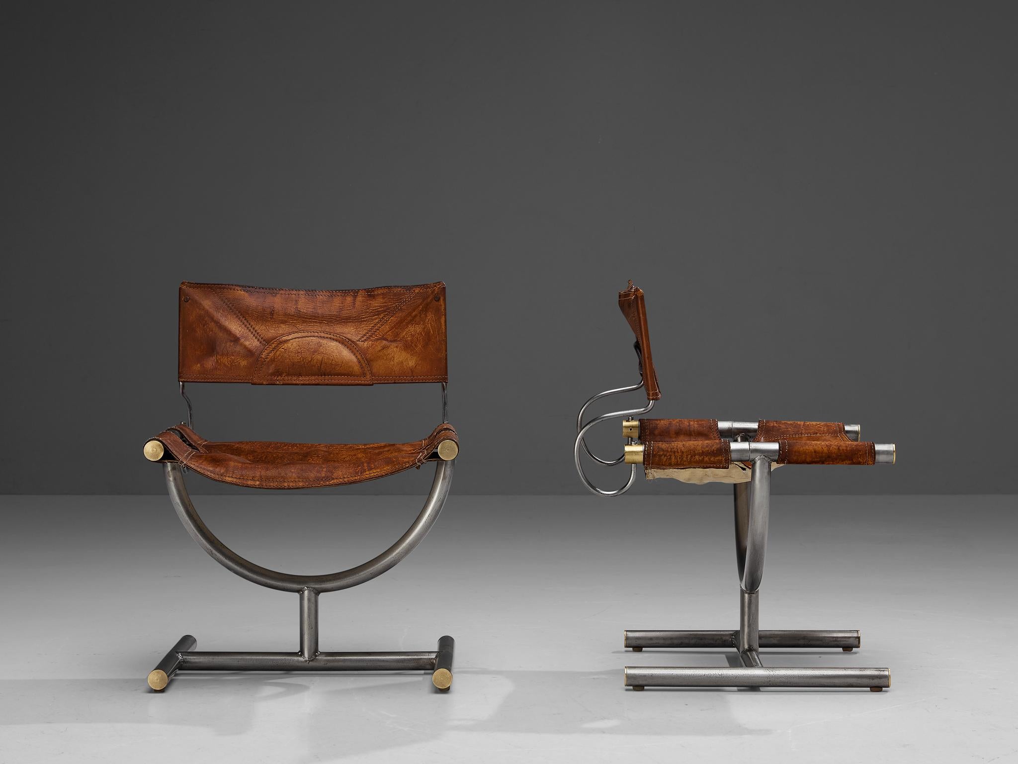Afra & Tobia Scarpa for Benetton Office, chairs, brass, leather, steel, Italy, 1985 

This pair of chairs is designed for the office of the clothing brand Benetton by Afra & Tobia Scarpa. These chairs are executed in original cognac leather and