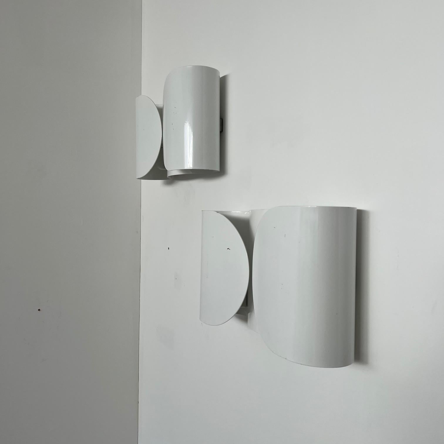 A pair of mid to late 20th wall lights. 

Italy, c1970s. 

'Foglio' model for Flos by esteemed designers Afra and Tobia Scarpa. 

Timeless design. 

Since re-wired and PAT tested. 

Condition is generally good but there are some scuffs and