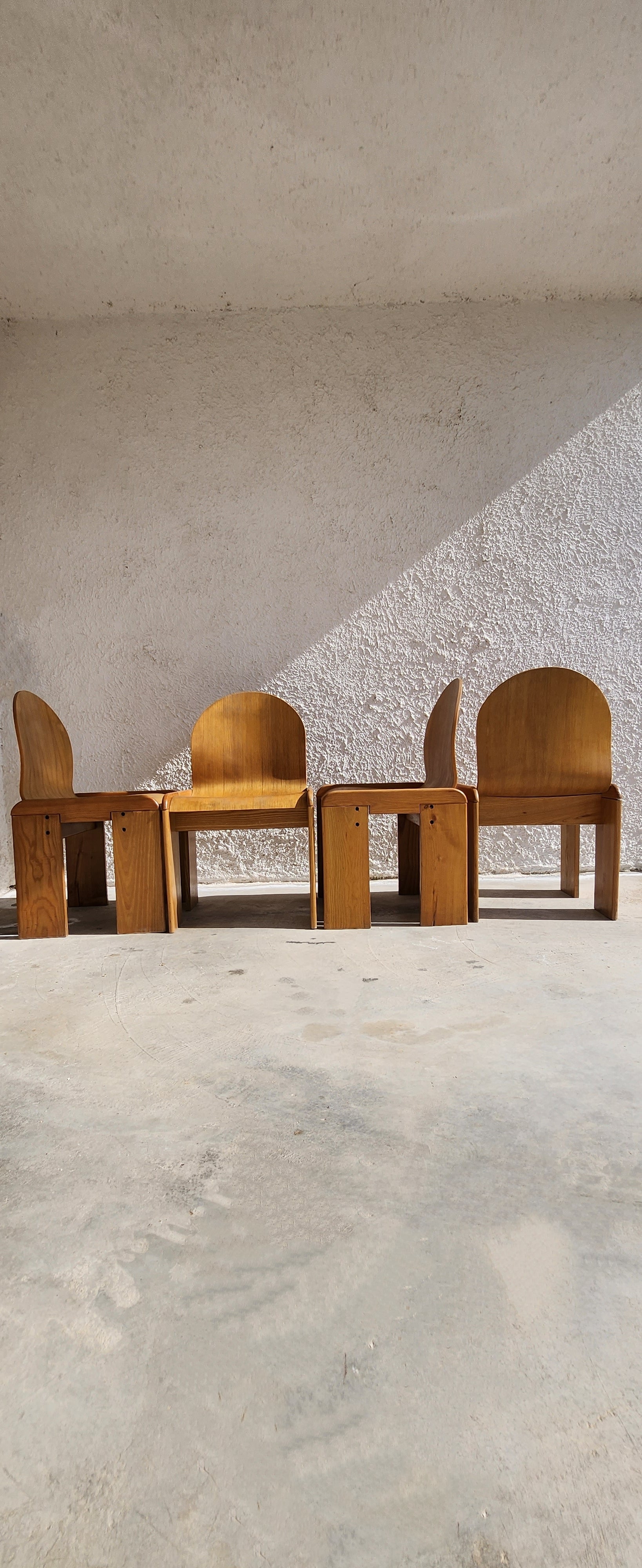 Very rare set of four plywood and pine chairs by Afra & Tobia Scarpa for Gavina 
The chairs are in their original condition, few scuffing and marks are visible on two chairs mainly alongside a nice patina that if anything, attributes value to the