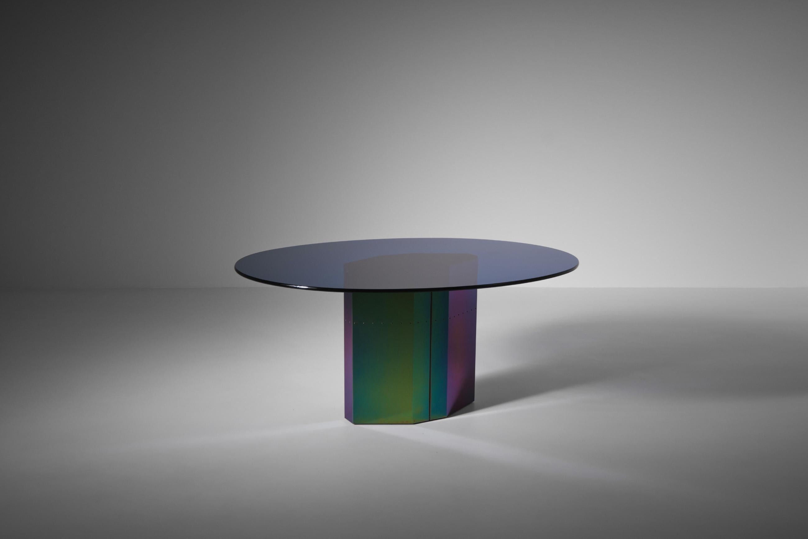 Rare and exceptional dining table mod. ‘Polygonon’ by Afra & Tobia Scarpa for B&B Italia, Italy 1984. The fantastic base is made from electro coated stainless sheets with an iridescent finish which shifts into different colors; from blue to green to