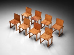 Conjunto de ocho sillas de comedor de Afra y Tobia Scarpa en nogal y piel de silla de montar color coñac