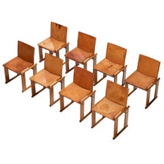 Conjunto de ocho sillas de comedor de Afra y Tobia Scarpa en nogal y piel de silla de montar color coñac