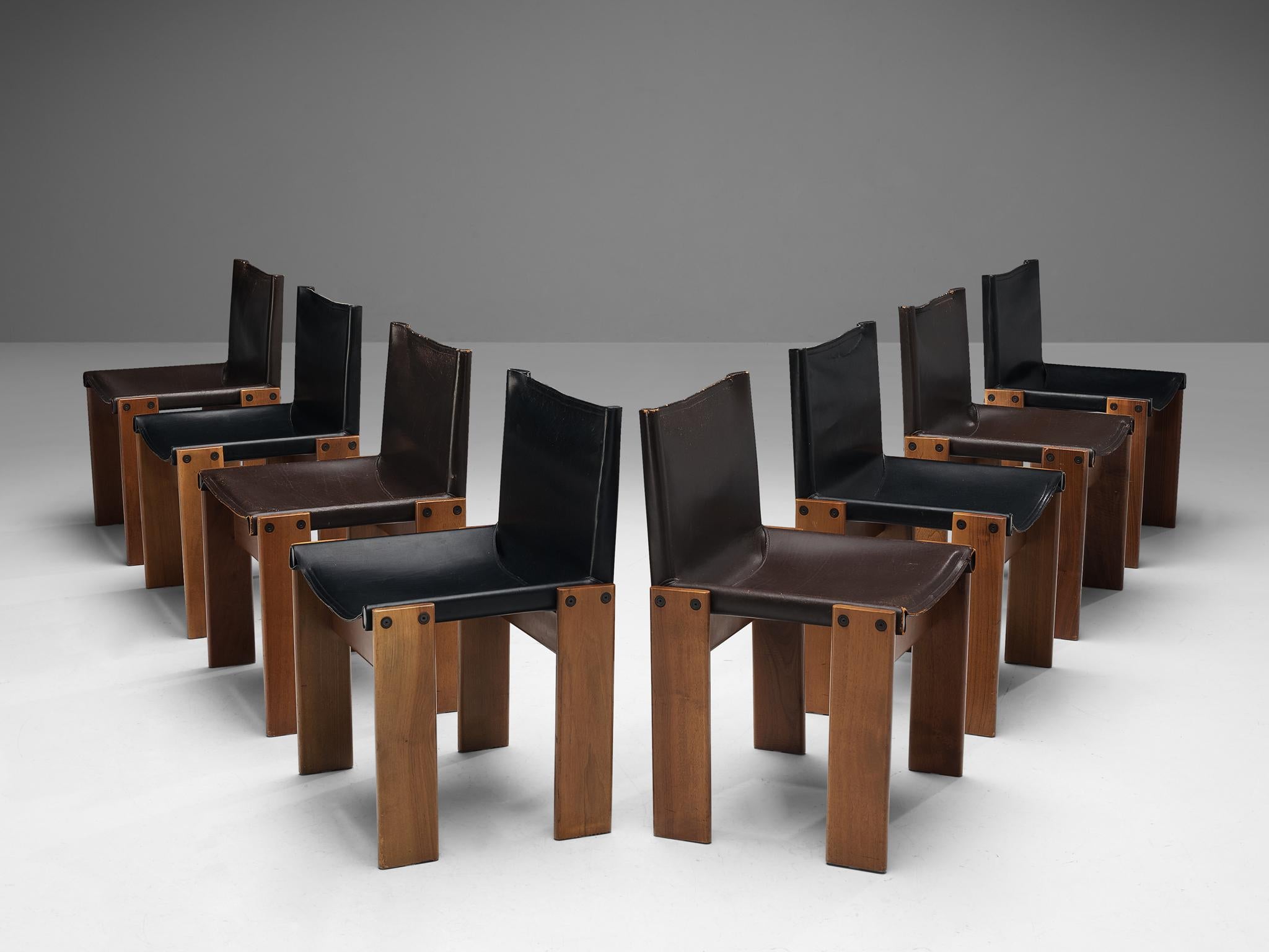 Afra & Tobia Scarpa for Molteni, dining chairs, model 'Monk', patinated walnut, black and brown leather, Italy, 1974 

The wonderfully deep black and brown leather forms a striking combination with the blond walnut. Interesting is the 'flat' shape
