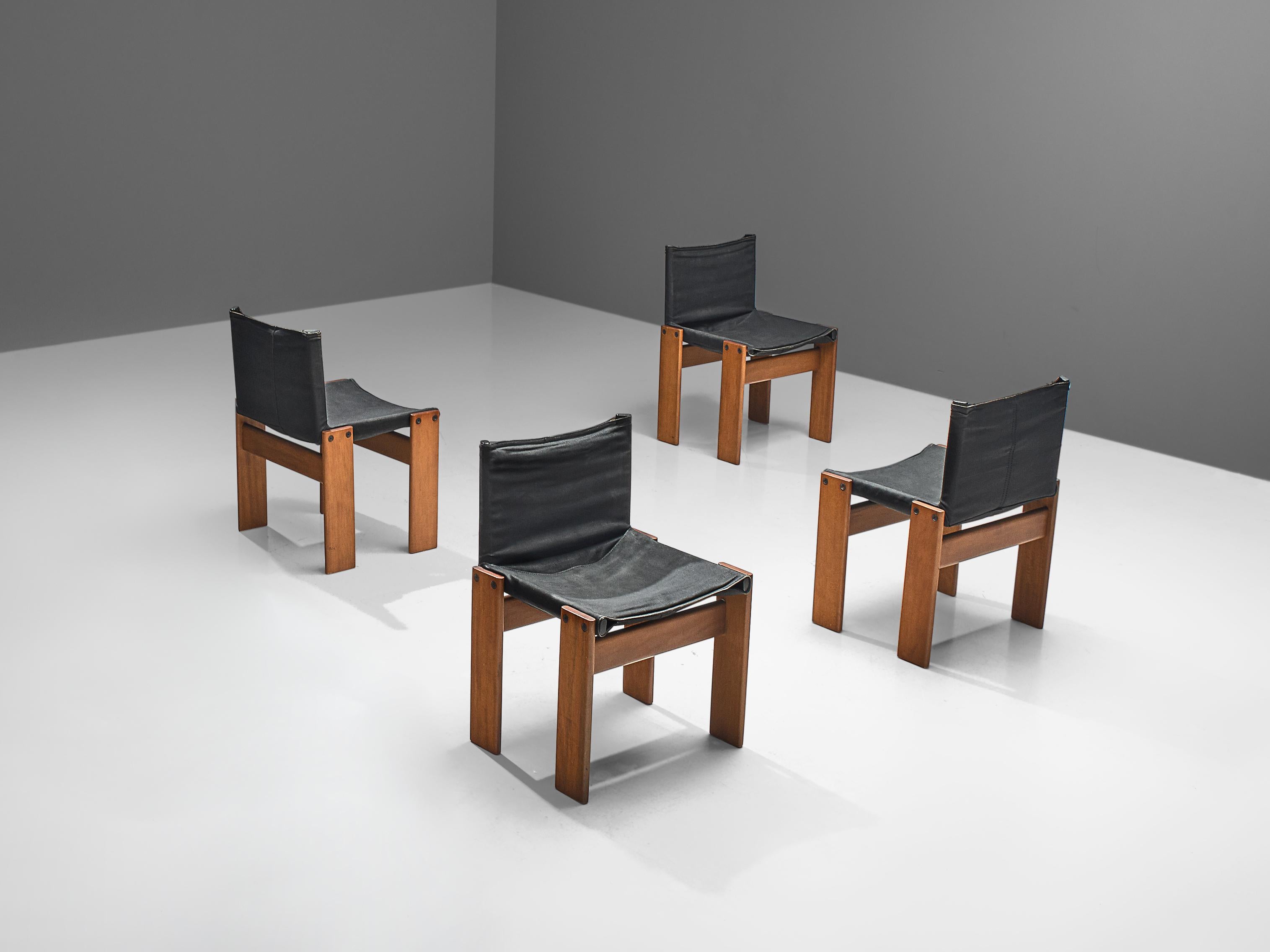 Afra & Tobia Scarpa for Molteni, set of four 'Monk' chairs, walnut and black canvas, Italy, 1974.

The black canvas forms a striking combination with the warm walnut wood. Interesting is the 'flat' shape of this chair where the designer has chosen