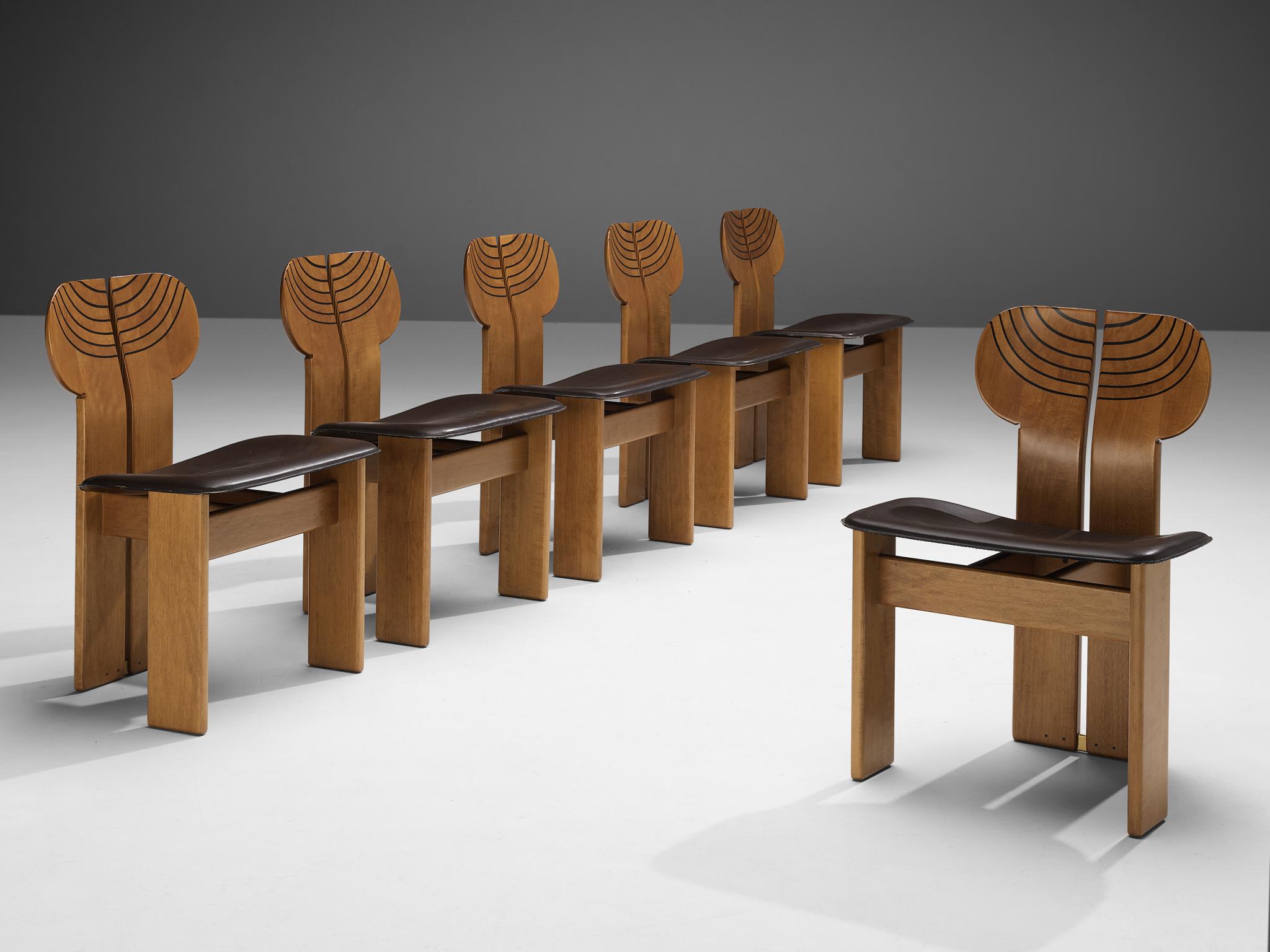 Afra & Tobia Scarpa for Maxalto, set of six dining chairs model 'Africa', dark grey leather, in walnut, ebony and brass, Italy, 1975.

This set of 'Africa' chairs explicitly sculptural grand chairs is designed by Afra & Tobia Scarpa. They are part