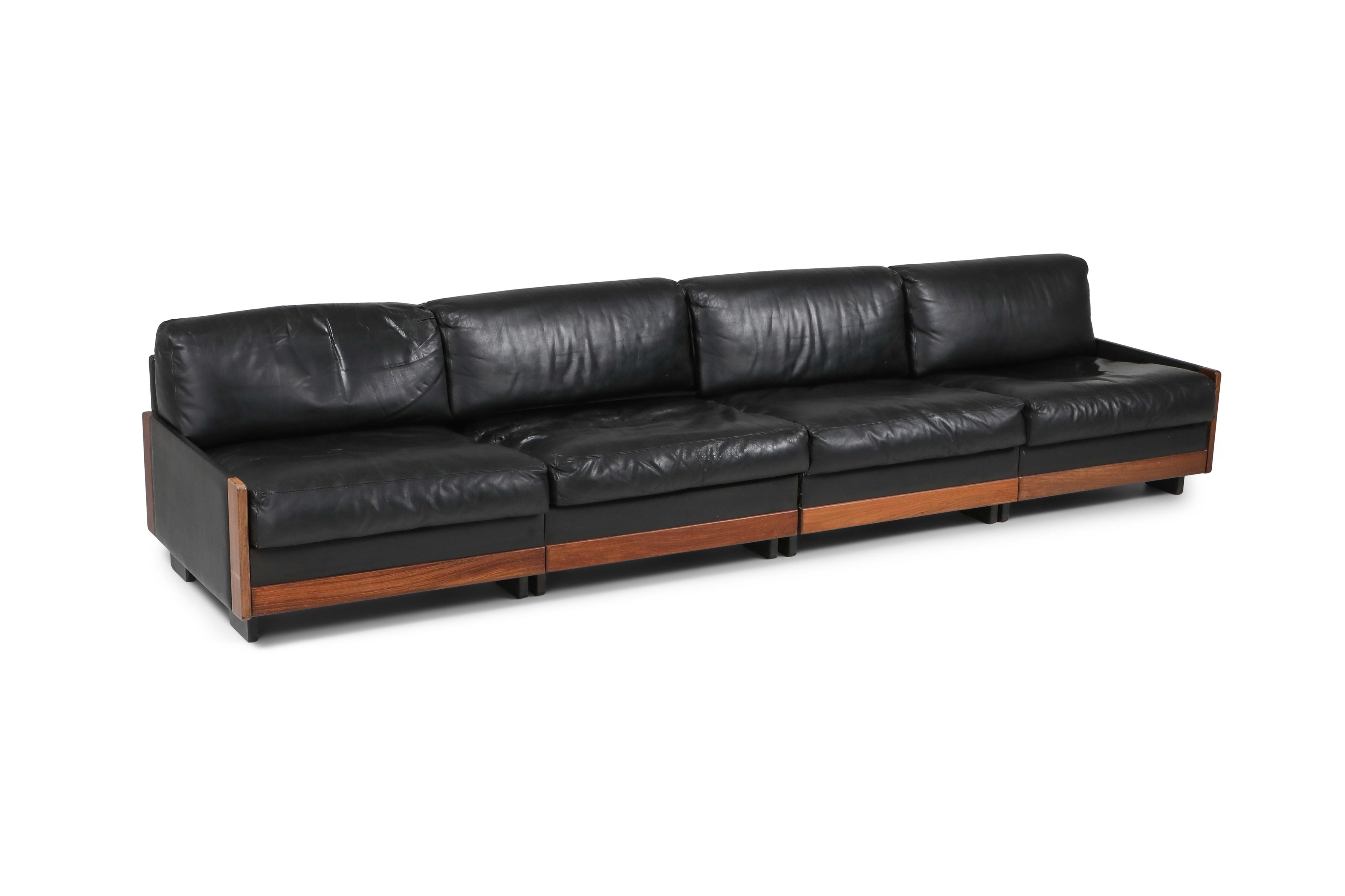 Black leather and walnut frame, model '920' couch, Afra & Tobia Scarpa, Cassina, 1970s

First edition four-seat sectional sofa produced by Figli di Amadeo Cassina
Midcentury to Postmodern piece by the famous designer duo.




 