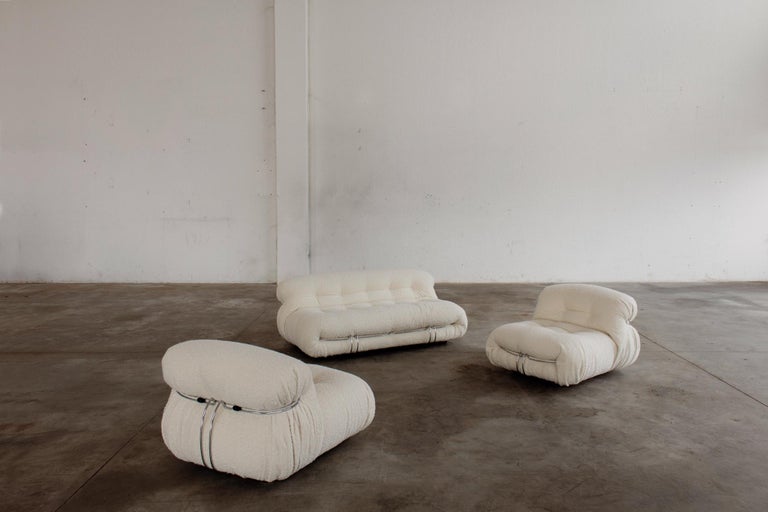 Afra & Tobia Scarpa “Soriana” living room set for Cassina, two-seater sofa and two lounge chairs, ivory bouclé wool and chromed steel, Italy, 1969, set of three.

Although technically designed in the 1960s, the 