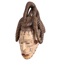 African Wooden Female Igbo Agbogo Tribal Mask Brown-Red-Beige Nigeria 1970s