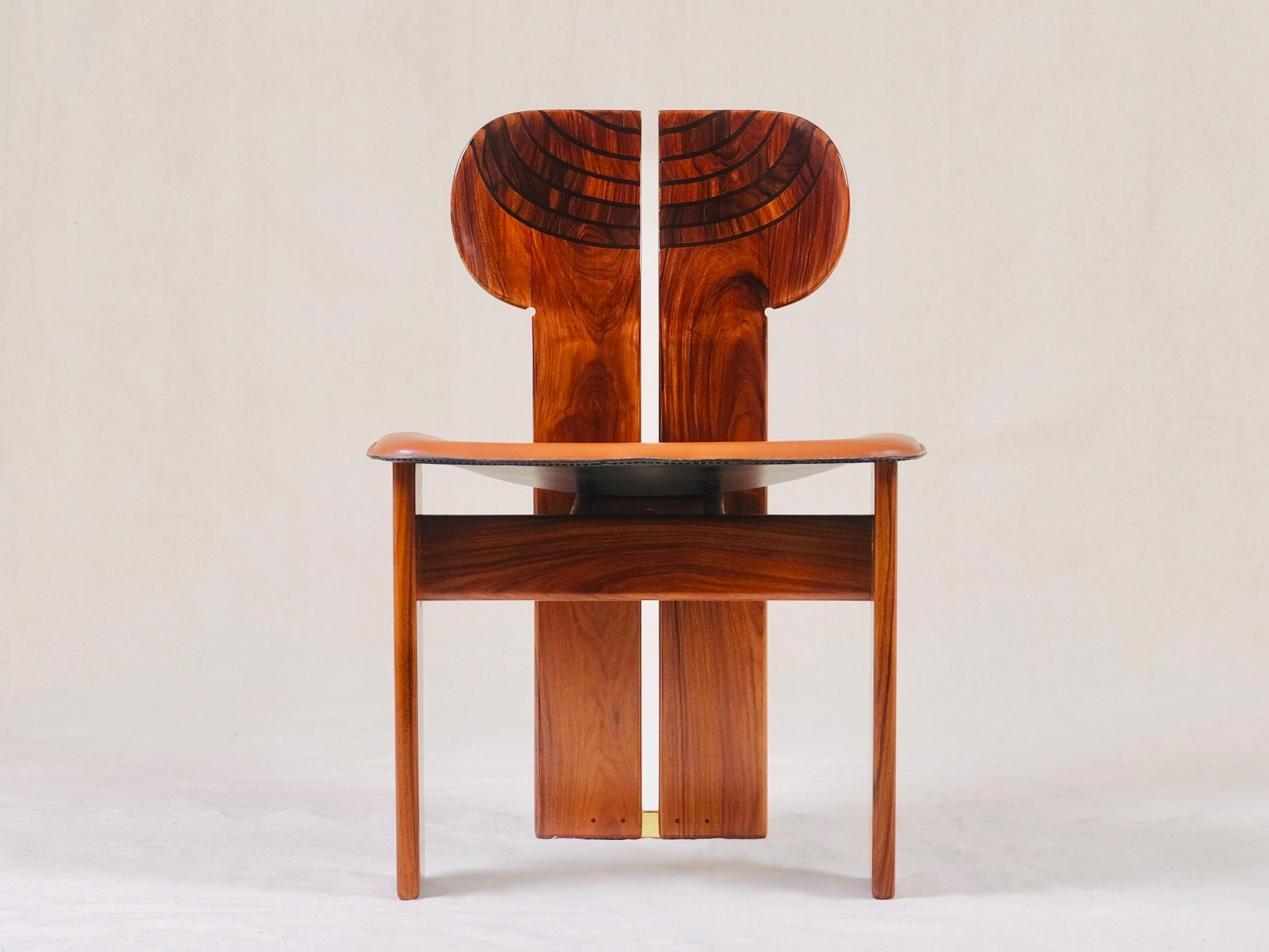 Set of four iconic ‘Africa’ chairs By Tobia & Afra Scarpa 
This design is of historical significance, being the first chair made by Max Alto in 1975.
They have been displayed at the M.O.M.A. New York.
These chairs are made from Italian Walnut< with