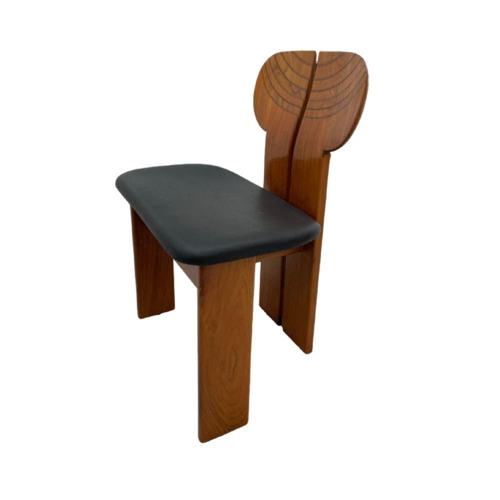 6 chairs 
79 x 56 x 46 cm
Brass, Leather, Rosewood