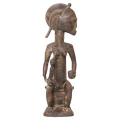 Maternité tribale africaine de la Côte d'Ivoire Baoule avec enfant sculpté en bois, 1930