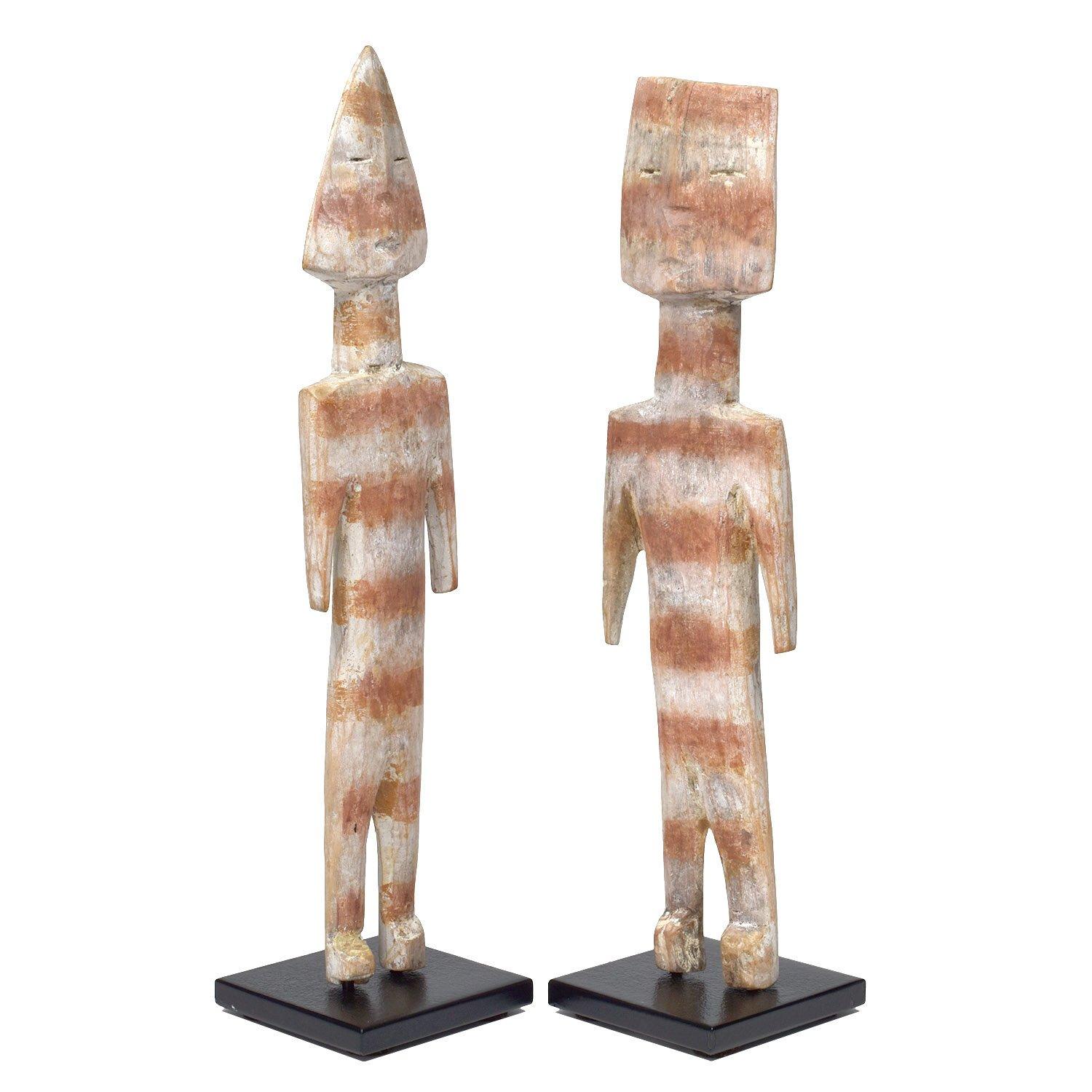 African Adja protective spirit figures Aklama twins.

Togo, Africa.
Wood, pigment.
20th Century
Left: 8 x 1.75 x 0.5 / 20 x 4.5 x 1 cm.
Right: 7.75 x 1.75 x 0.5 in. / 19.5 x 4.5 x 1 cm.