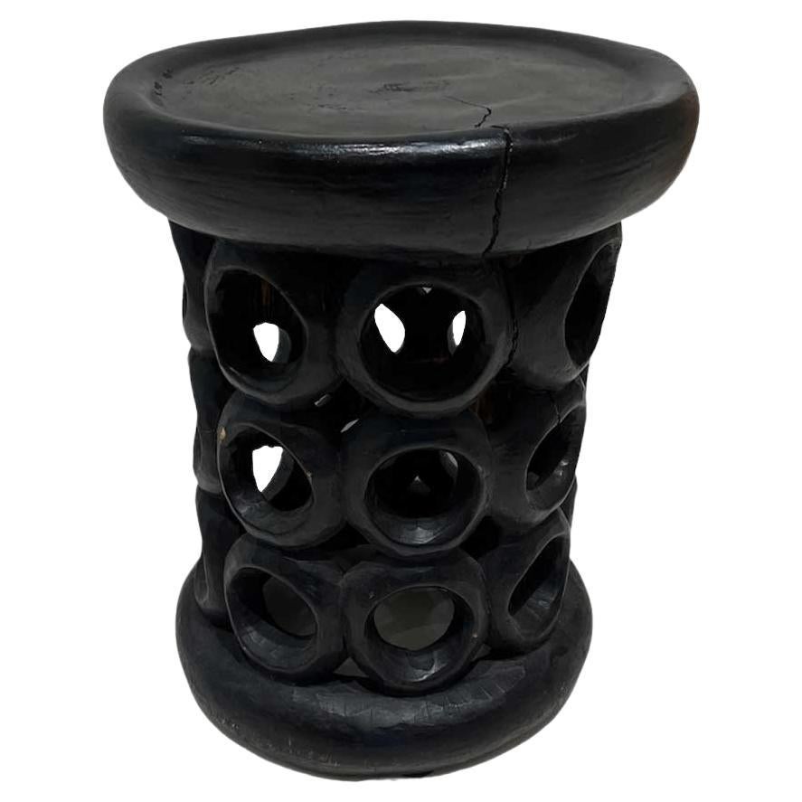Taburete africano bamileke tallado a mano