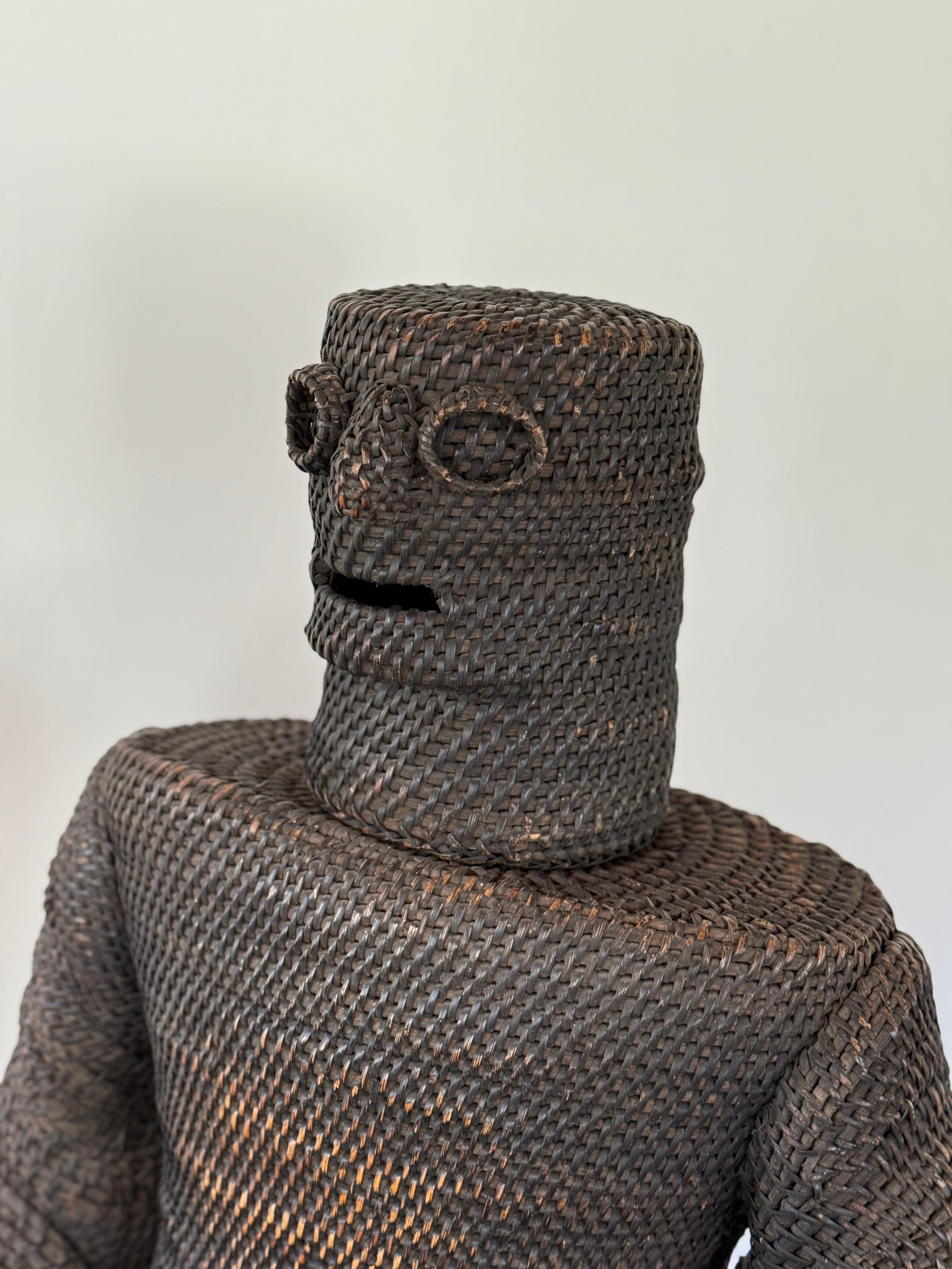 Afrikanisches Korbgeflecht figuraler Häuptlingsstuhl (Rattan) im Angebot