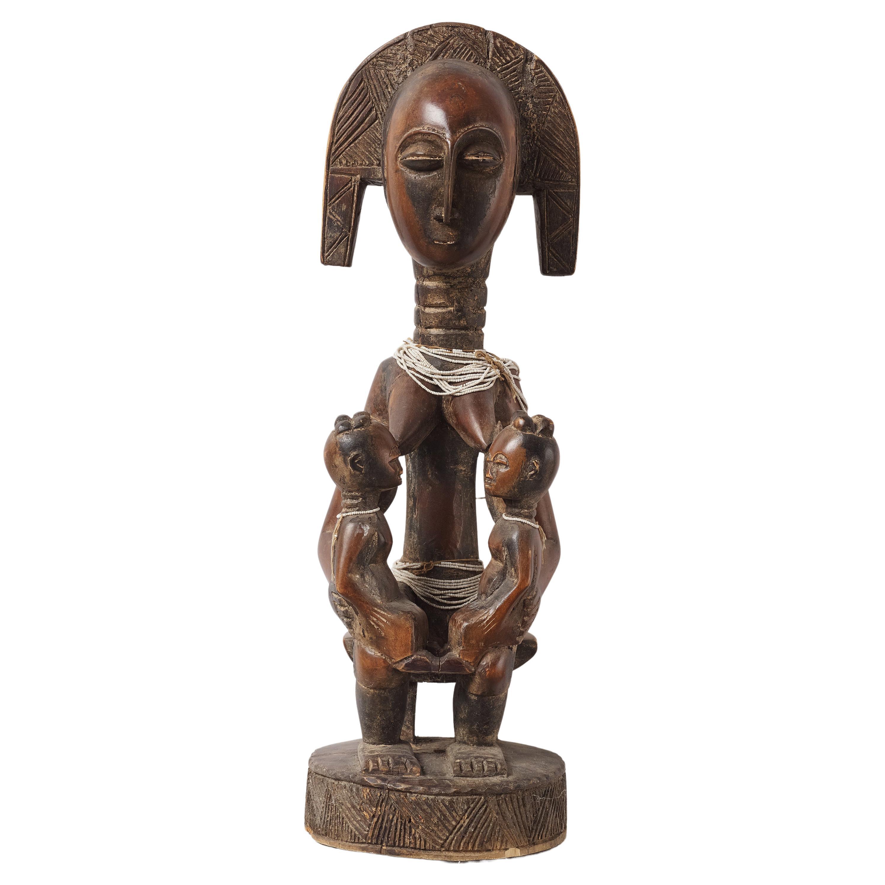 African Baule statue Mother with Childs, Ivory Coast mid  XXem For Sale