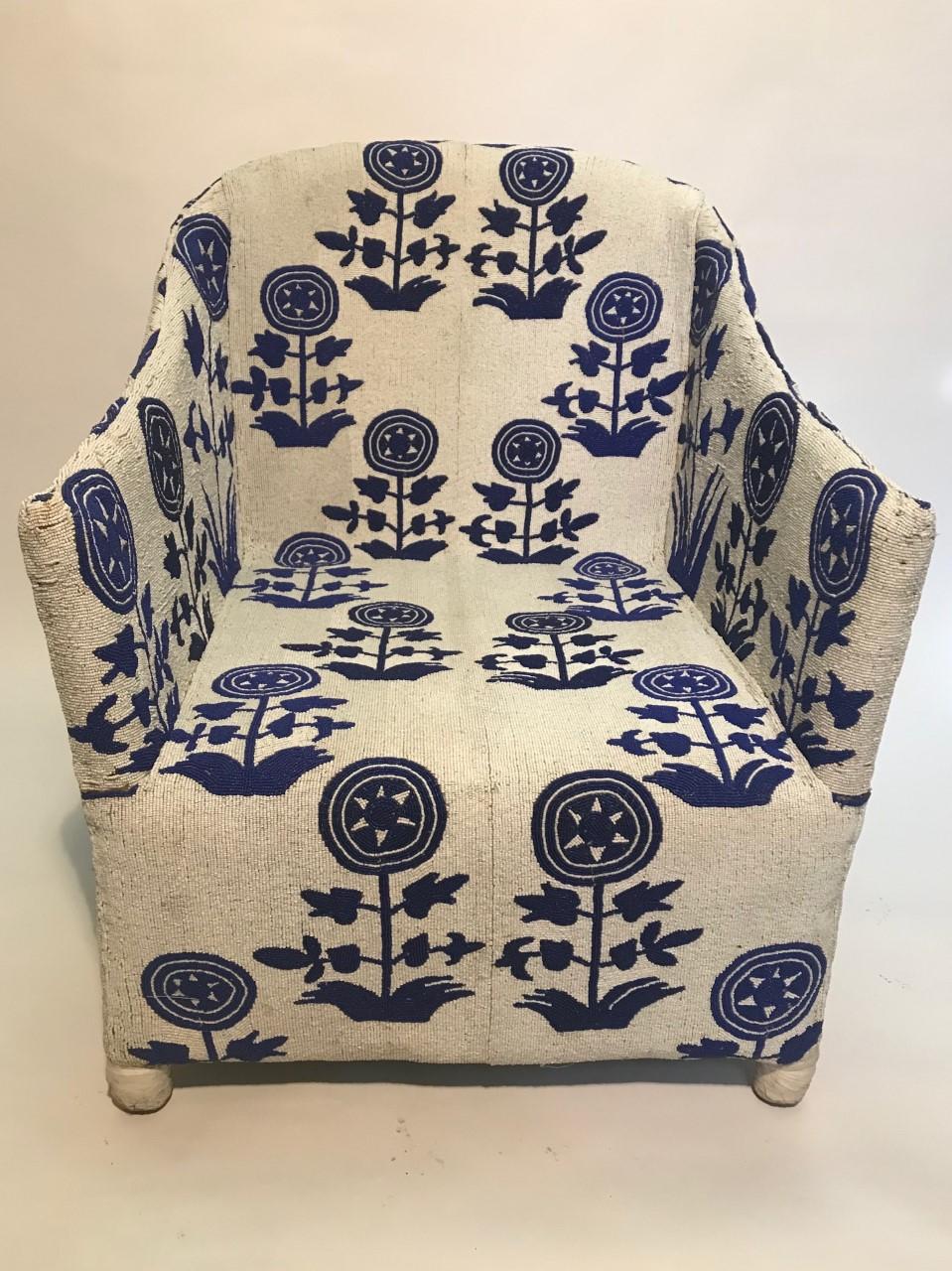 These African beaded chairs are handmade by the women of a tribe in central Africa. They are custom ordered and made to match Michelle Nussbaumer's famous Champa Nalini fabric pattern.